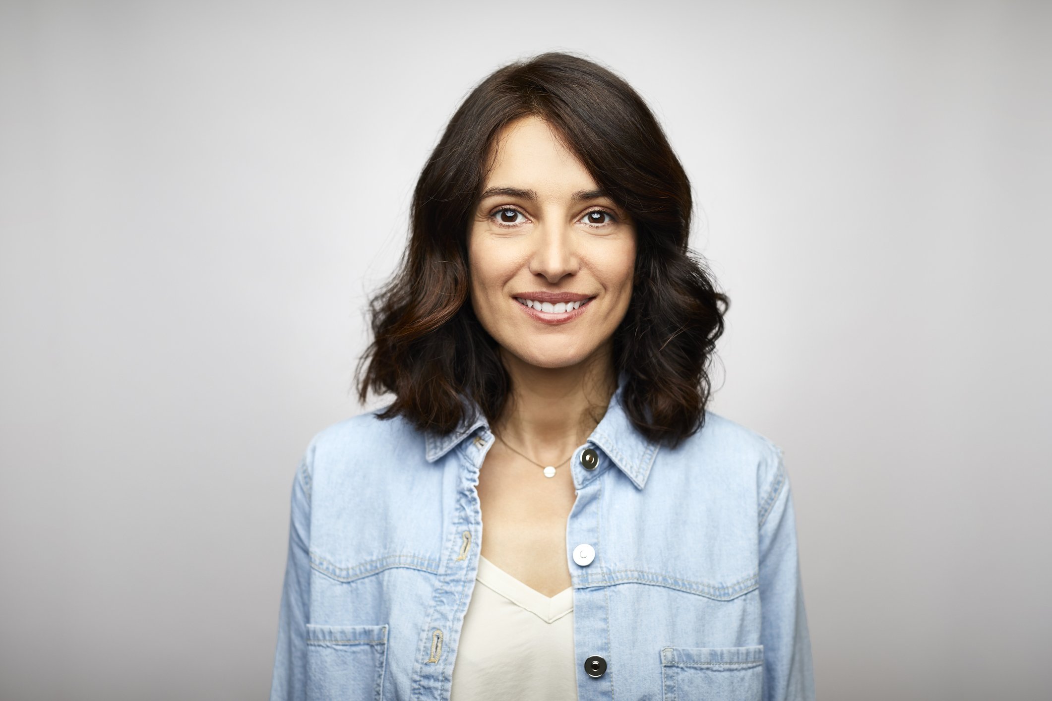 Portrait of a lady wearing a blue denim. | Photo: Getty Images