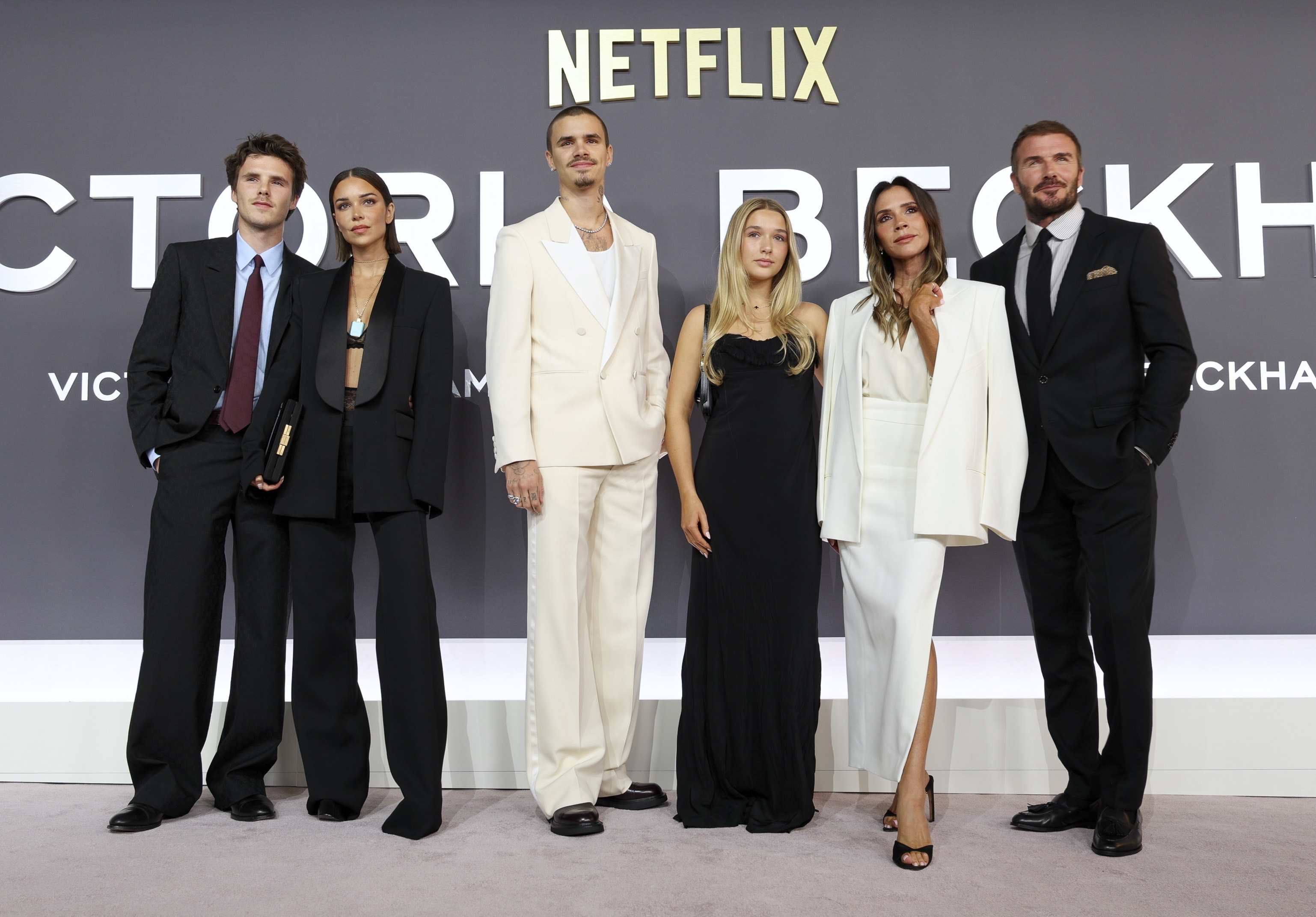 Cruz Beckham, Jackie Apostel, Romeo Beckham, Harper Beckham, Victoria Beckham and David Beckham attend the "Victoria Beckham" World Premiere at the Curzon Mayfair on 8 October 2025 in London, England. | Source: Getty Images