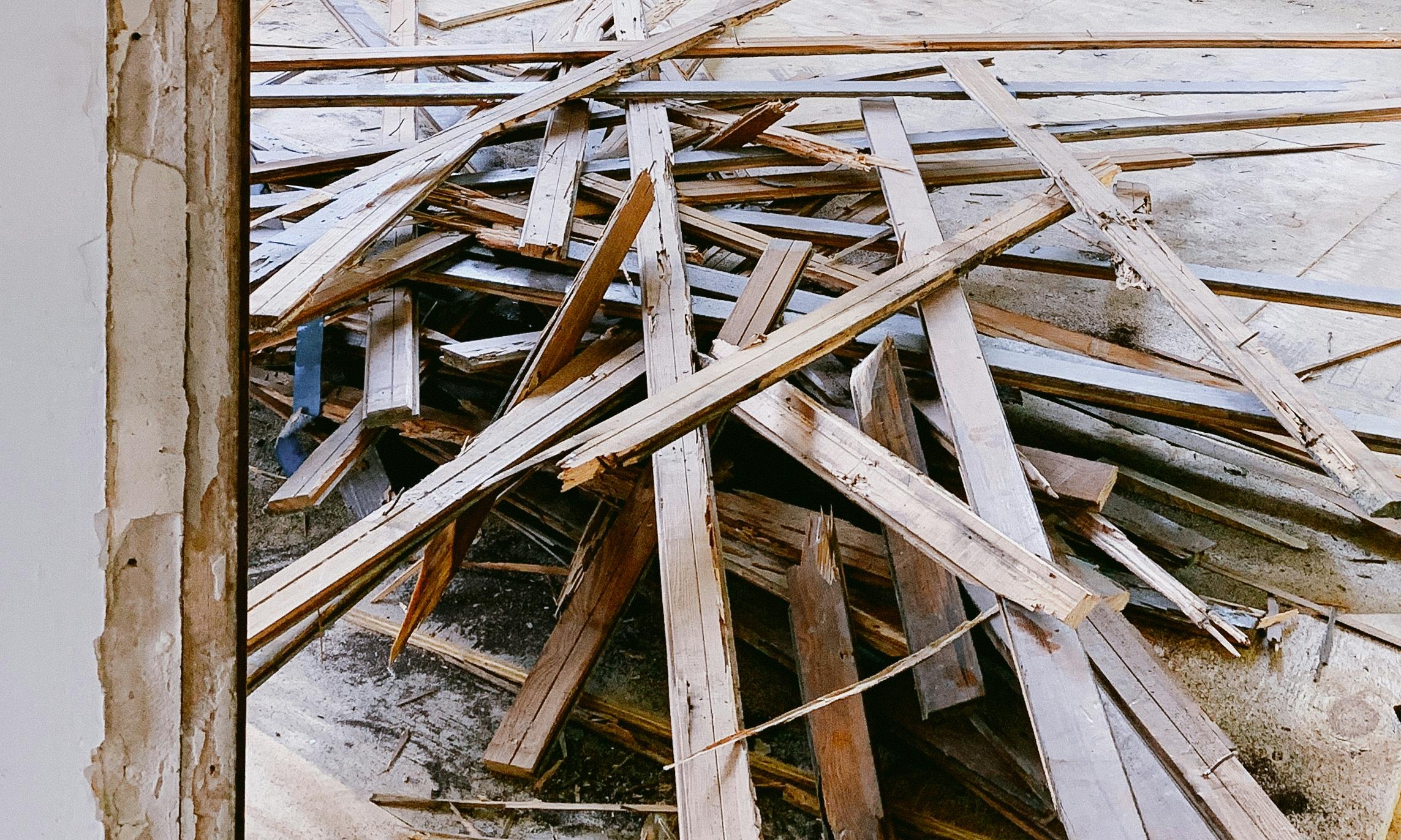 Strips of wood in a pile | Source: Pexels