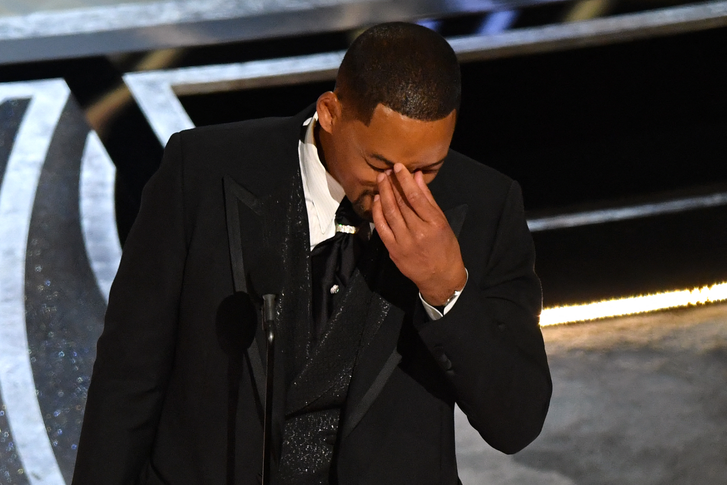 US actor Will Smith accepts the award for Best Actor in a Leading Role for "King Richard" onstage during the 94th Oscars at the Dolby Theatre in Hollywood, California, on March 27, 2022 | Source: Getty Images