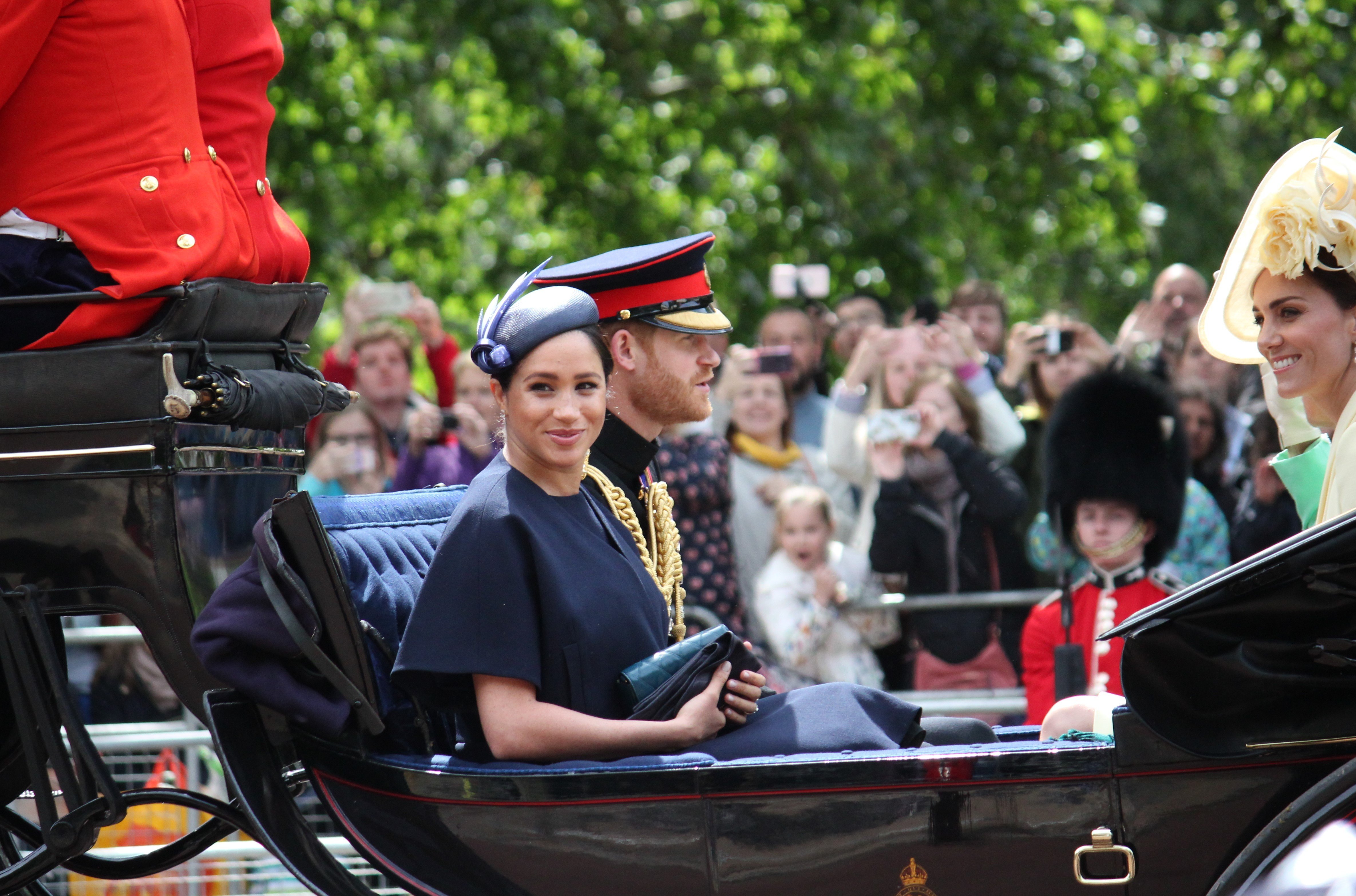 Meghan Markle, Prince Harry, and Kate Middleton arrive at Trooping the Color in June 2019 | Photo: Getty Images