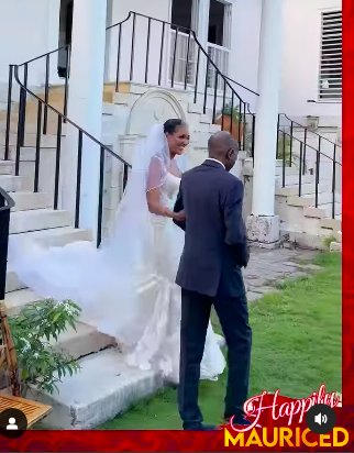 Stephanie Wash making her way down the aisle with her dad, Ricky Wash, on her wedding day, posted on July 13, 2024 | Source: Instagram/jamaicaobserver