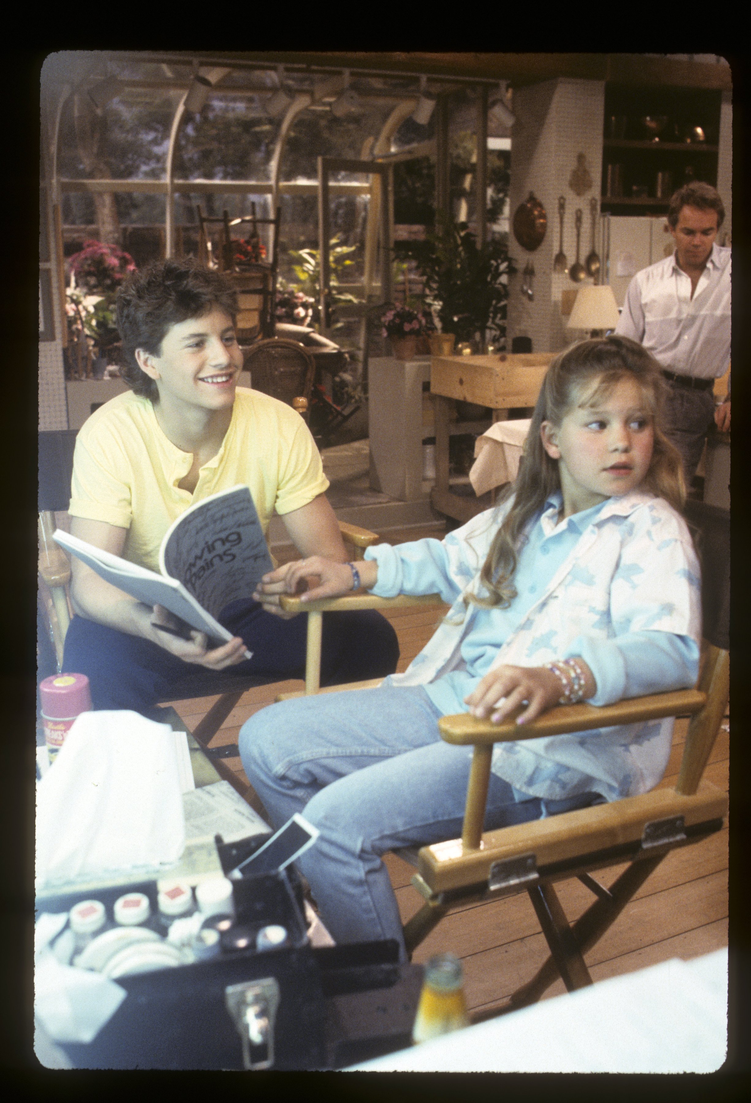 Kirk Cameron and Candace Cameron Bure behind the scenes of "Growing Pains" in 1987 | Source: Getty Images 