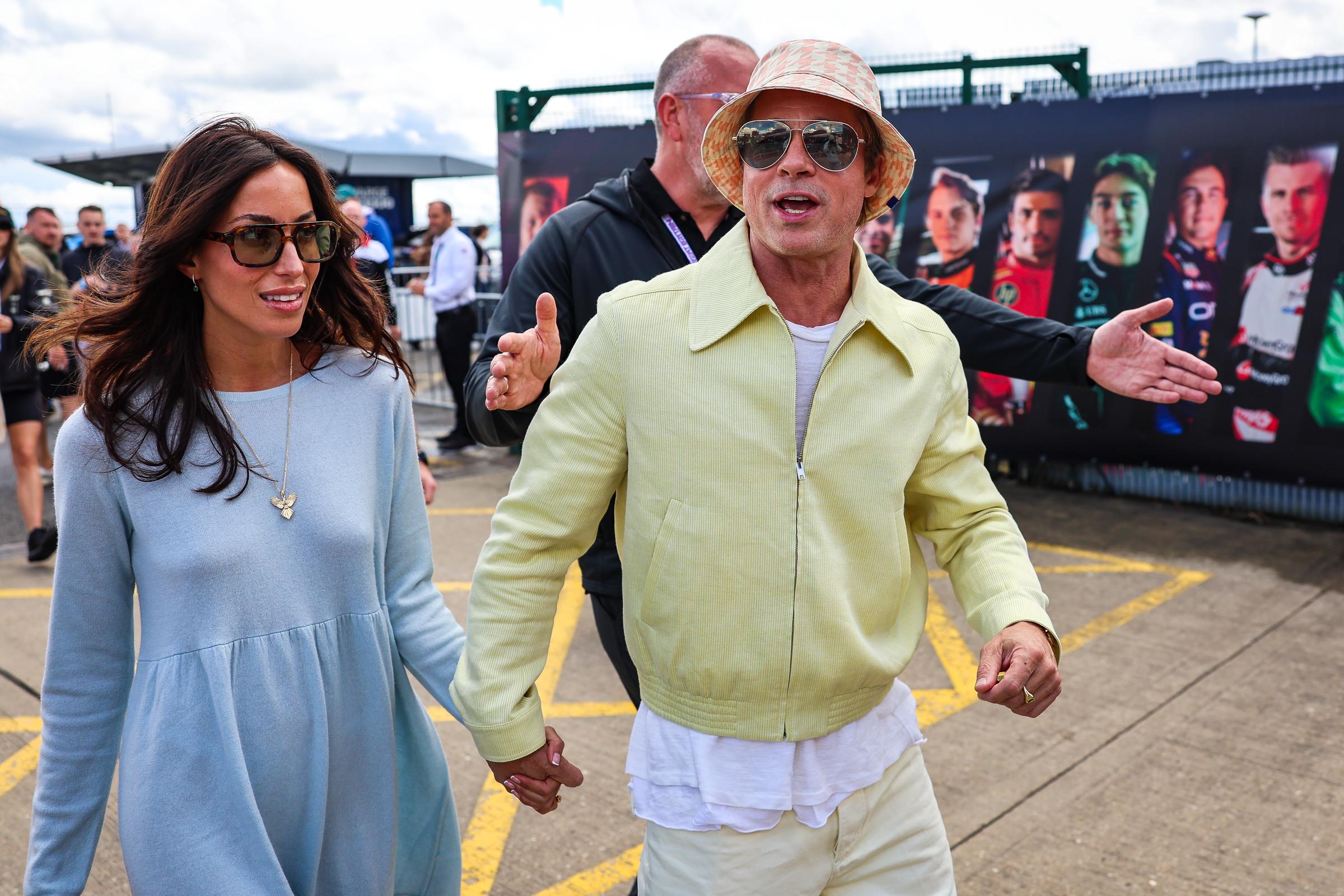 Ines de Ramon and Brad Pitt at the F1 Grand Prix of Great Britain at Silverstone Circuit in Northampton, England on July 7, 2024 | Source: Getty Images