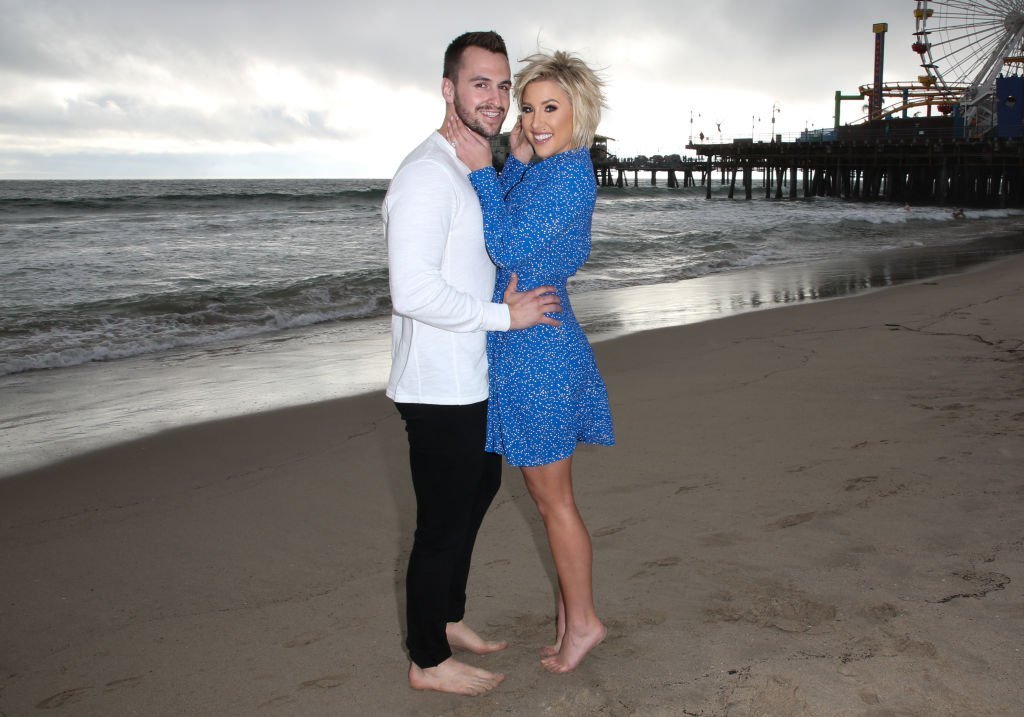 Savannah Chrisley and fiance Nic Kerdiles on the beach as they celebrate their Engagement from December 2018 | Photo: Getty Images