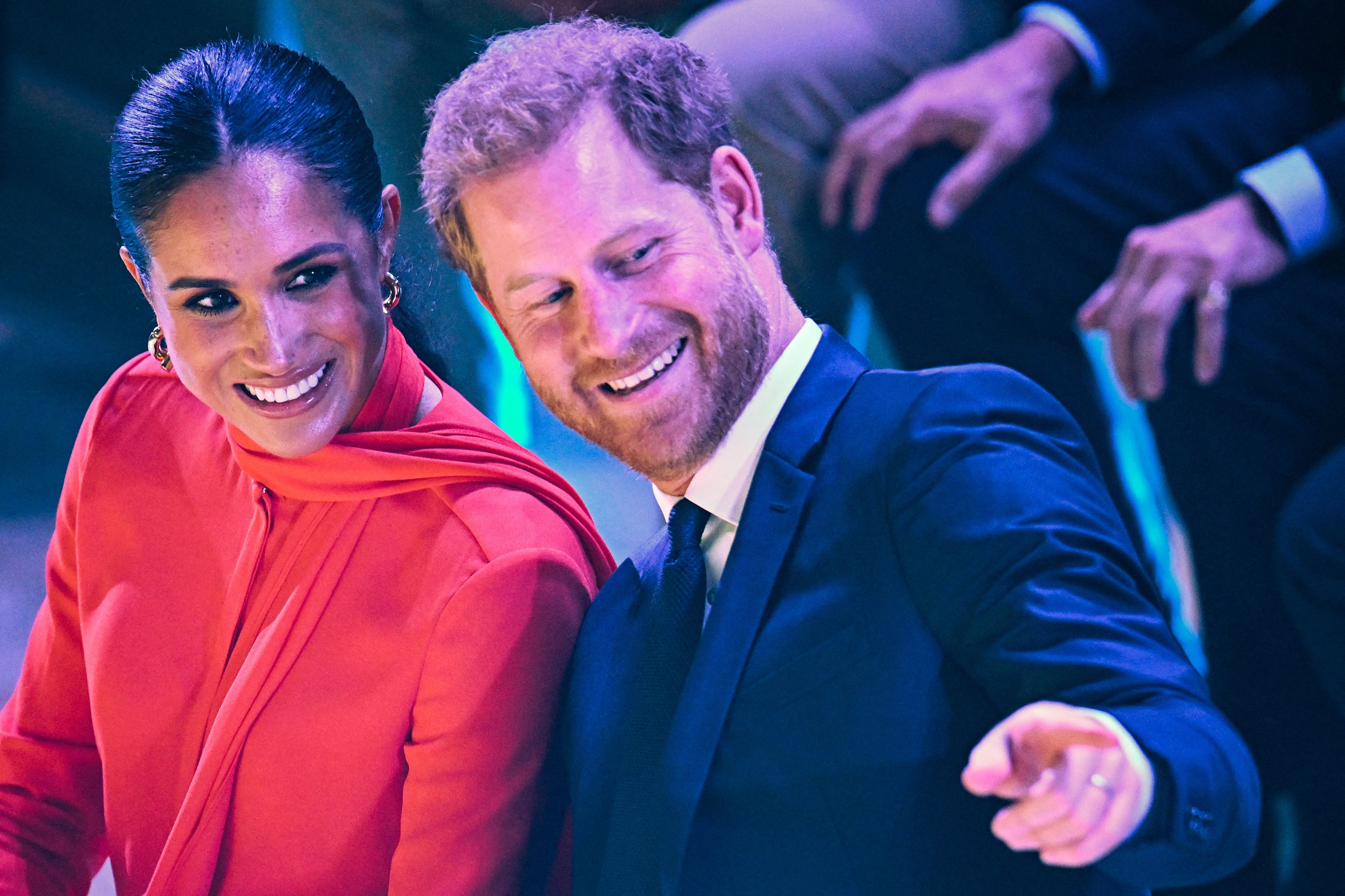 Meghan, Duchess of Sussex and Prince Harry, Duke of Sussex, react as they attend the annual One Young World Summit in Manchester, north-west England on September 5, 2022. | Source: Getty Images