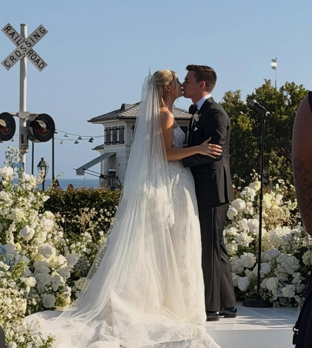 Ava Sambora and Tyler Farrar are photographed during their wedding ceremony on May 16, 2026. | Source: X/SamboraItalia