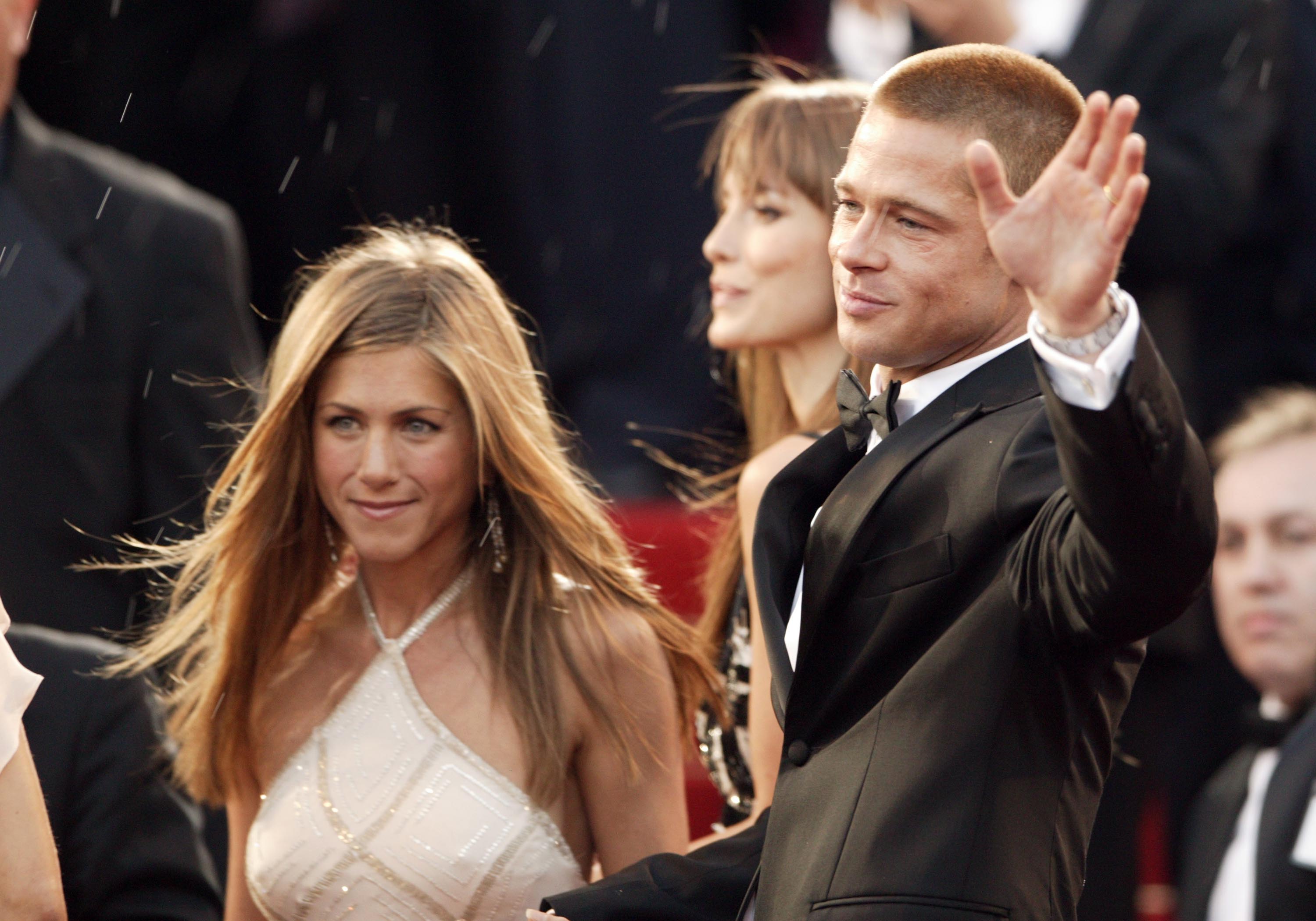 Brad Pitt and Jennifer Aniston attend the World Premiere of epic movie "Troy" at Le Palais de Festival on May 13, 2004 in Cannes, France. | Source: Getty Images.