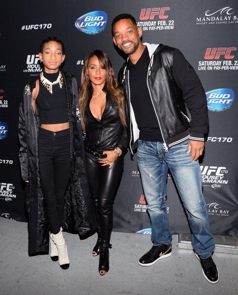  Willow Smith, actress/producer Jada Pinkett Smith and actor Will Smith attend the UFC 170 event at the Mandalay Bay Events Center on February 22, 2014, in Las Vegas, Nevada. | Source: Getty Images.