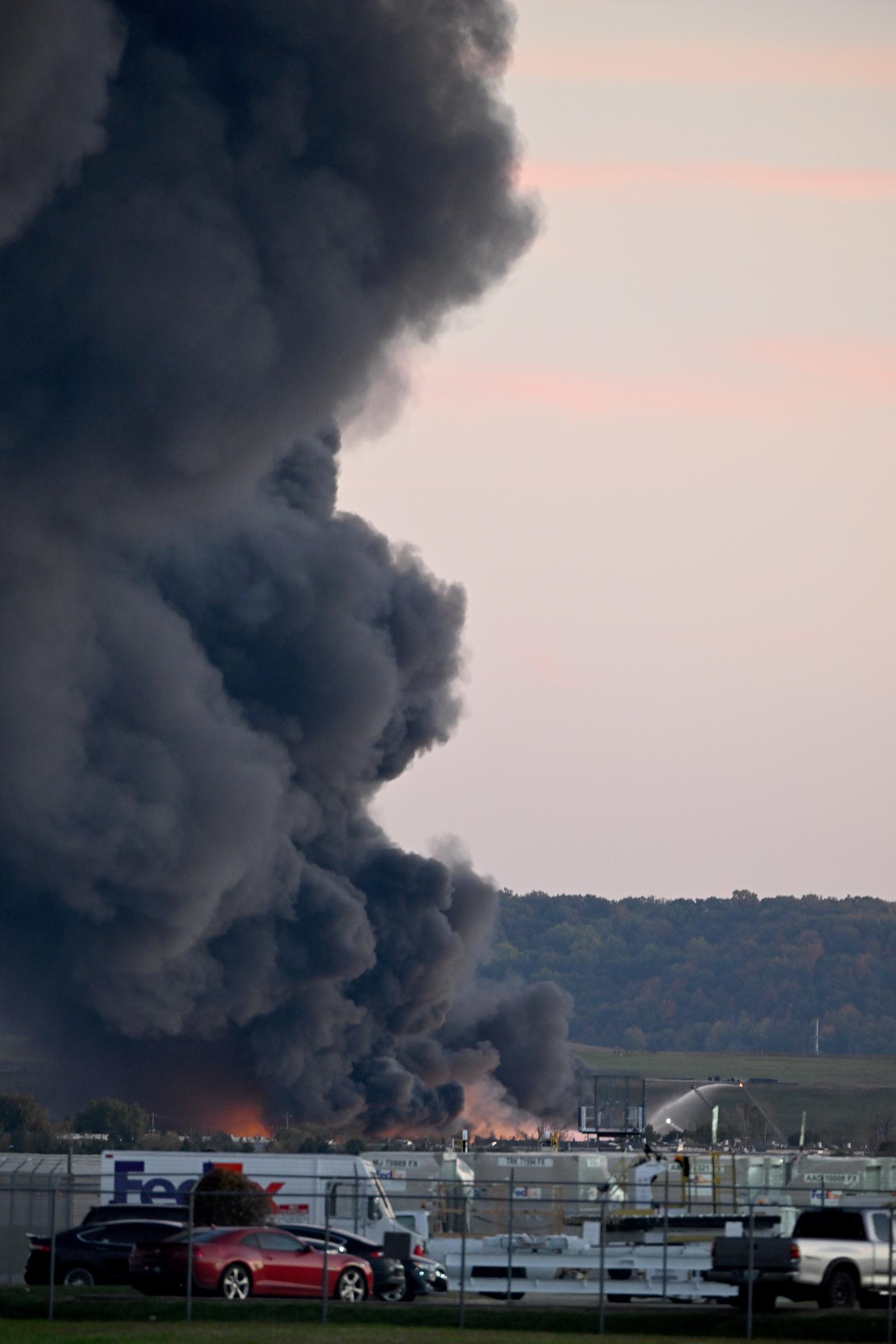 Another view of the thick, black smoke after the crash. | Source: Getty Images