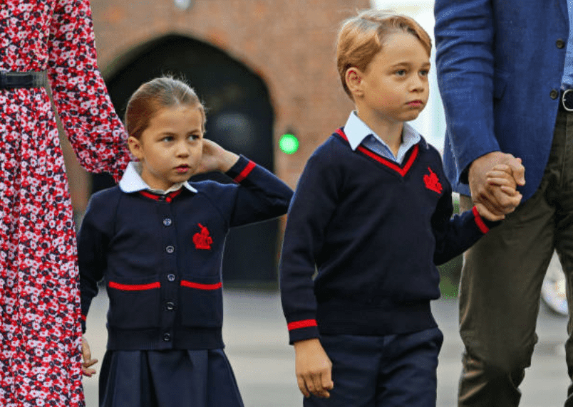 Princess Charlotte and her brother, Prince George arrive with their parents Kate Middleton and Prince William for their first day of school at Thomas's Battersea, on September 5, 2019, in London, England | Source: AARON CHOWN/AFP via Getty Images