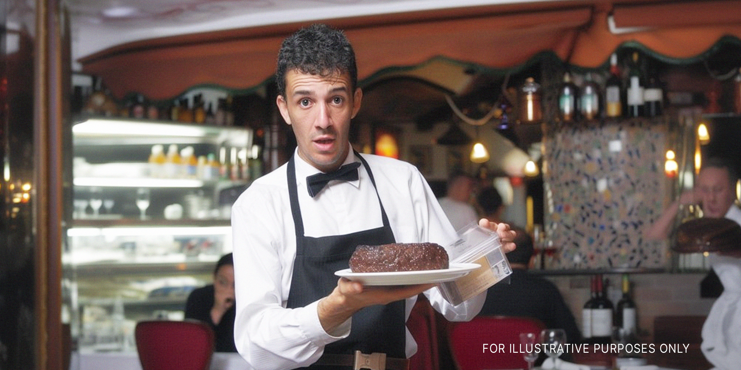 A waiter holding a plate of meatloaf | Source: Midjourney