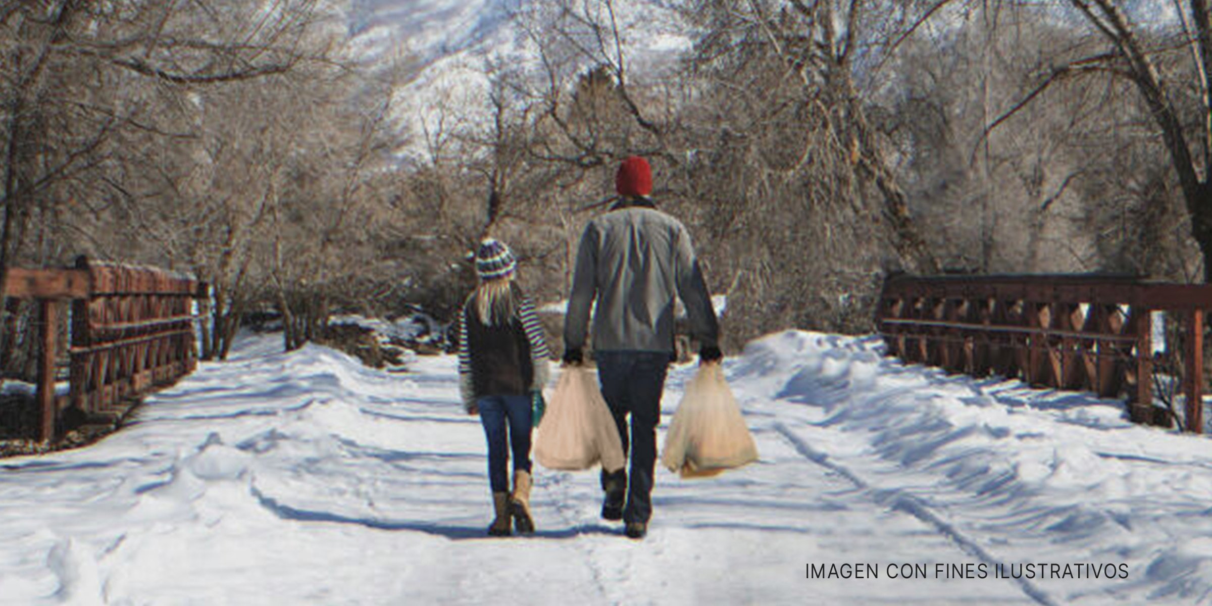 Un hombre y una niña caminando con comestibles. | Foto: Getty Images | Shutterstock