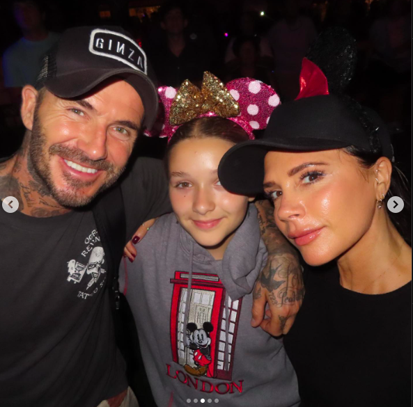 David, Harper and Victoria Beckham posing for a picture during Harper's 12th birthday celebration, posted on July 11, 2023 | Source: Instagram/victoriabeckham