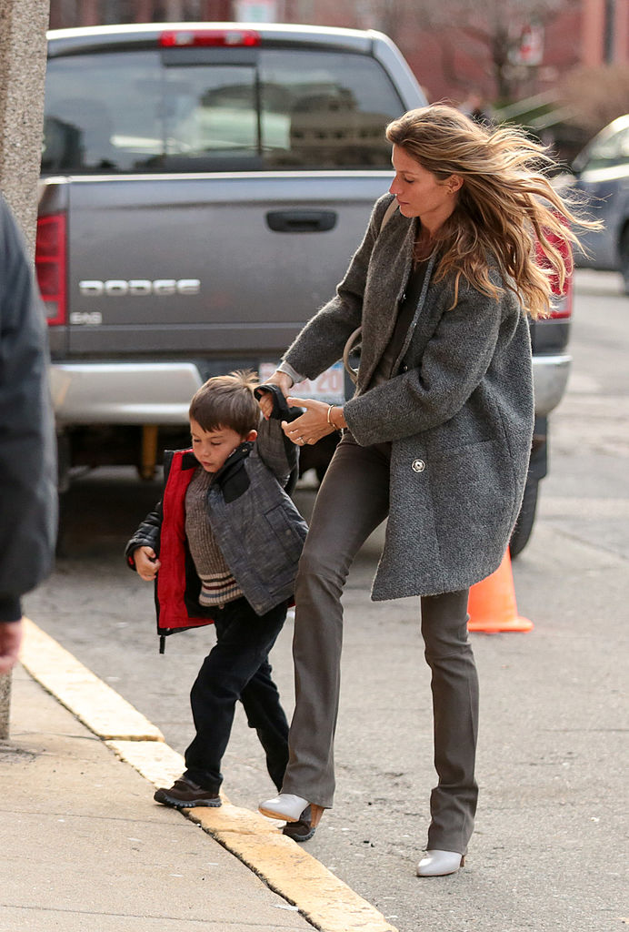 Gisele Bundchen with son, Benjamin Brady are seen on December 24, 2013 in Boston, Massachusetts. (Photo by Stickman/Bauer-Griffin/GC Images)