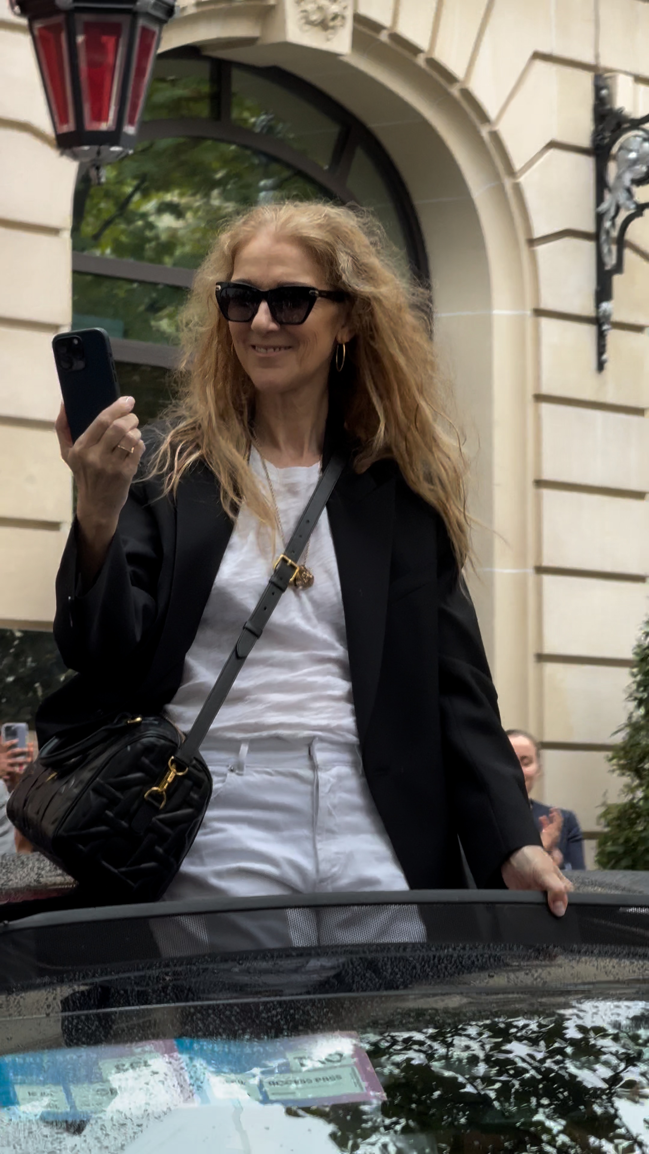 Celine Dion is seen leaving her Paris hotel on July 27, 2024 | Source: Getty Images