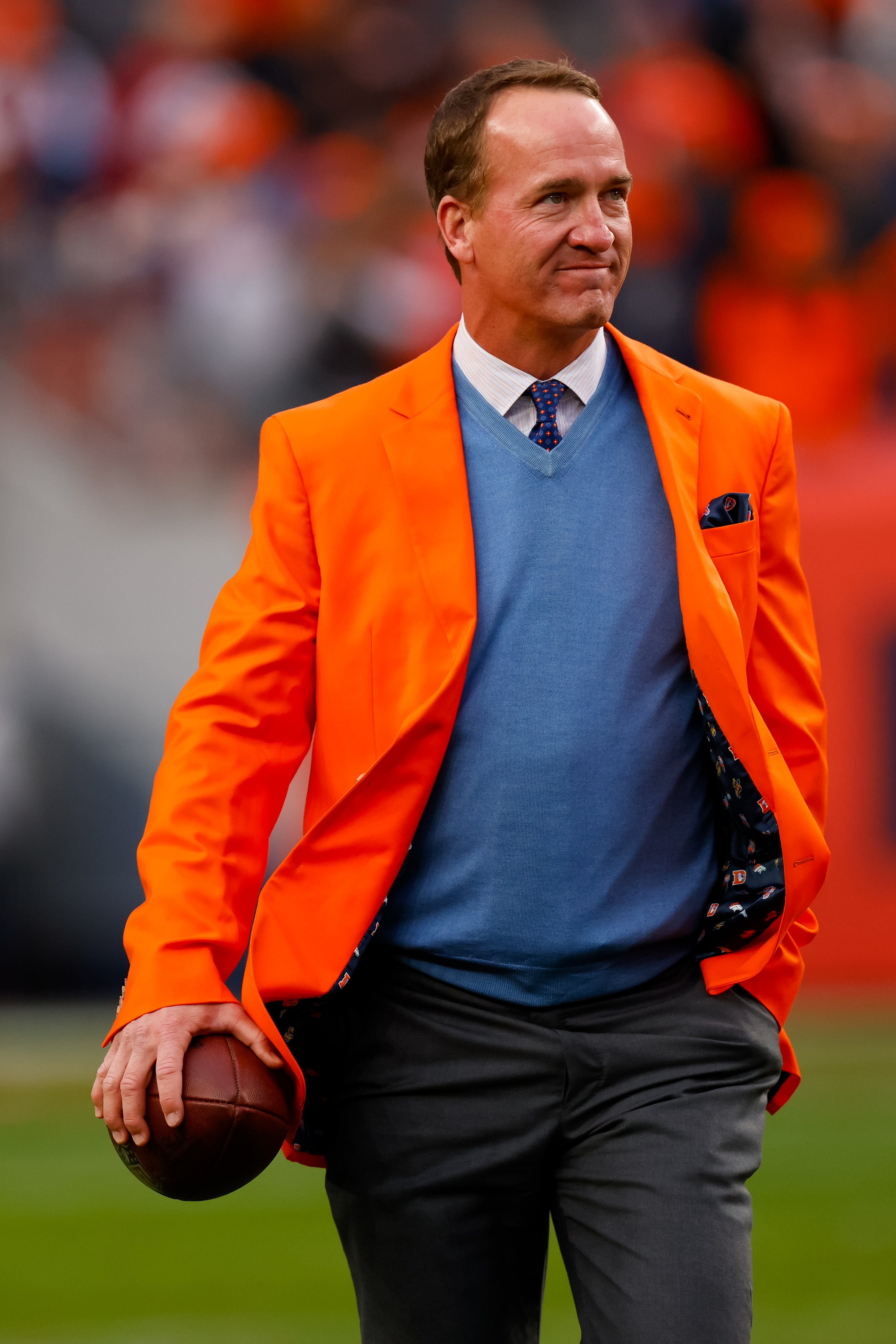 Peyton Manning on the field at a ceremony to enshrine him into the Broncos Ring of Fame in Denver on October 31, 2021 | Source: Getty Images