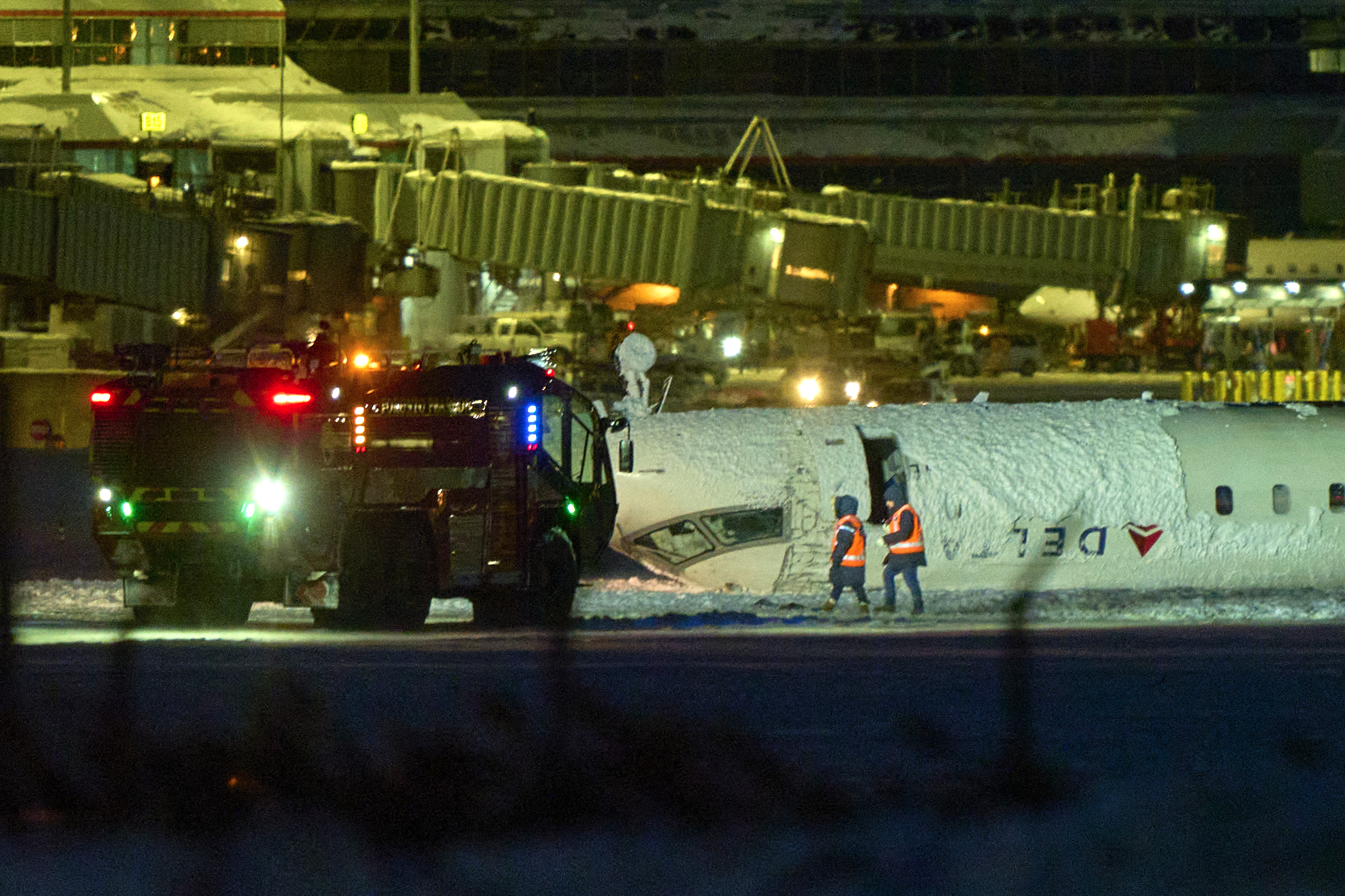 A Delta airlines plane after crashing upon landing at Toronto Pearson Airport in Toronto, Ontario, on February 17, 2025 | Source: Getty Images