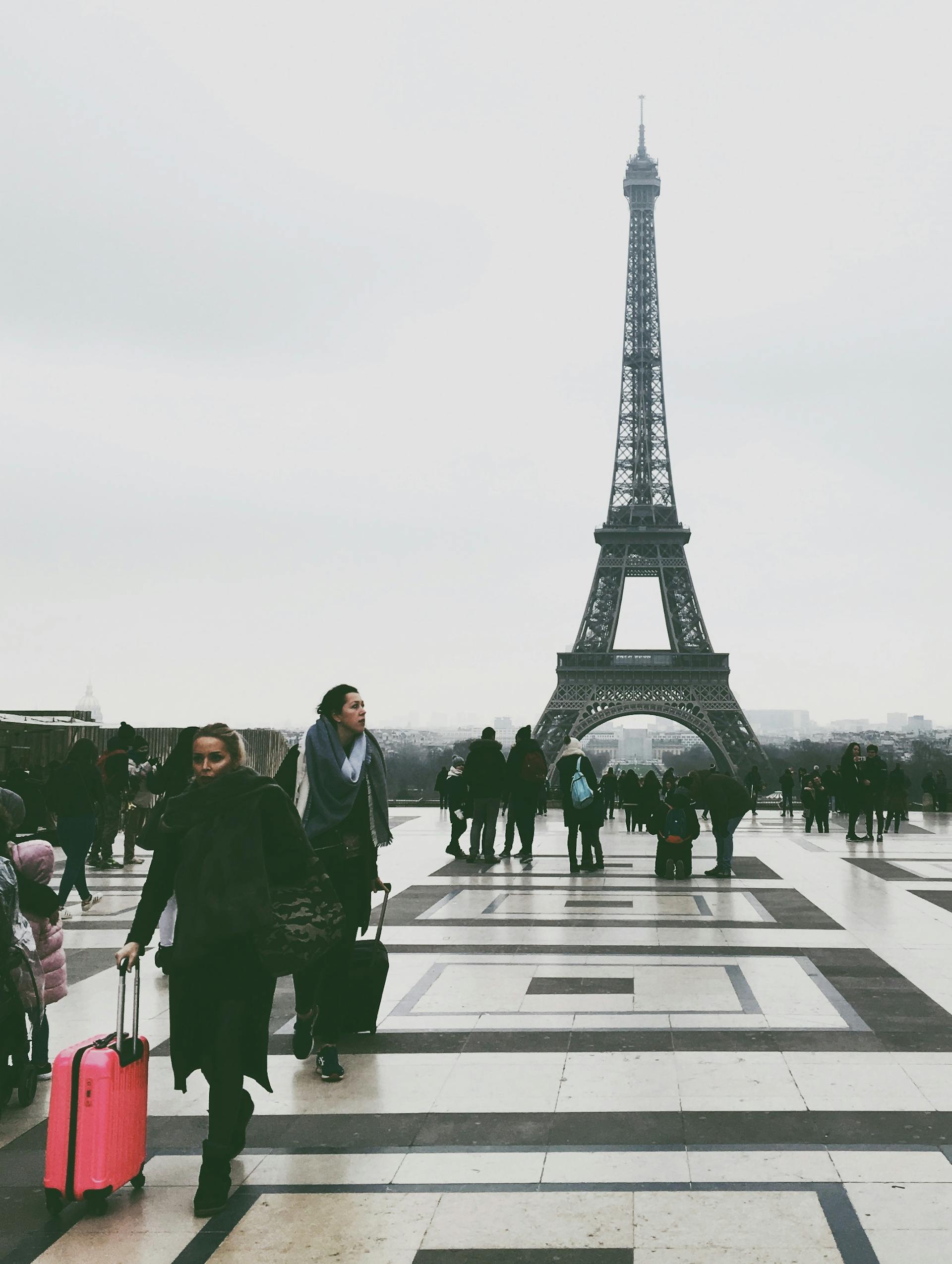 People around the Eiffel Tower | Source: Pexels