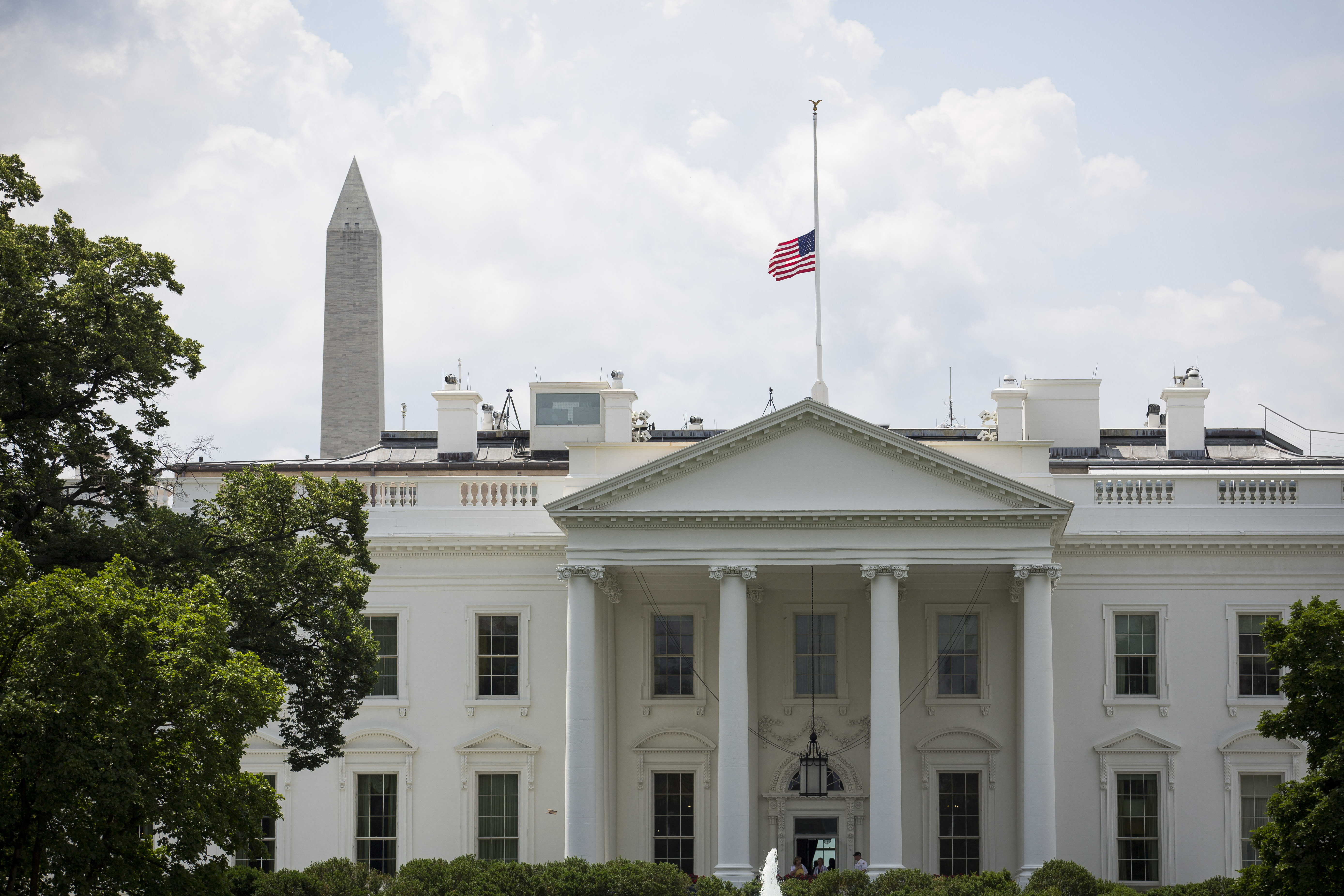 The U.S. flag flies at half-staff at the White House in honor of Beau Biden on June 6, 2015, in Washington, D.C. | Source: Getty Images