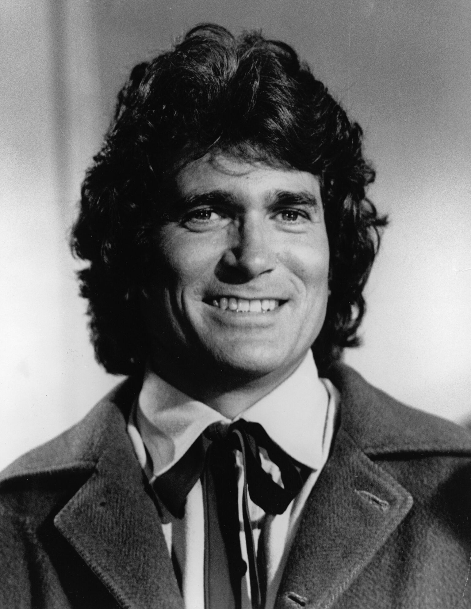 Michael Landon (1936 - 1991) smiling in costume from the television series, "The Little House On The Prairie" | Getty Images