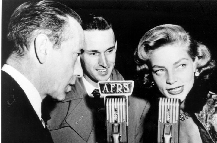 Humphrey Bogart and Lauren Bacall during an interview with Armed Forces Radio Services. | Source: Wikimedia Commons