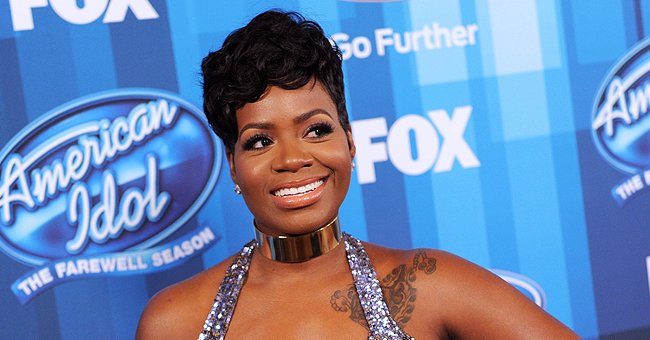 Fantasia S Daughter Zion Rocks Daring Tight Gown With Sheer Sleeves Wearing 2 Hair Puffs Nose