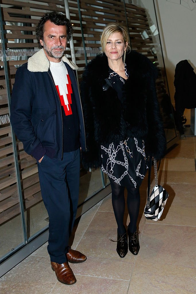 Éric Lartigau and Marina Foïs à la Fashion Week à Paris, mars 2016. Photo : Getty Images