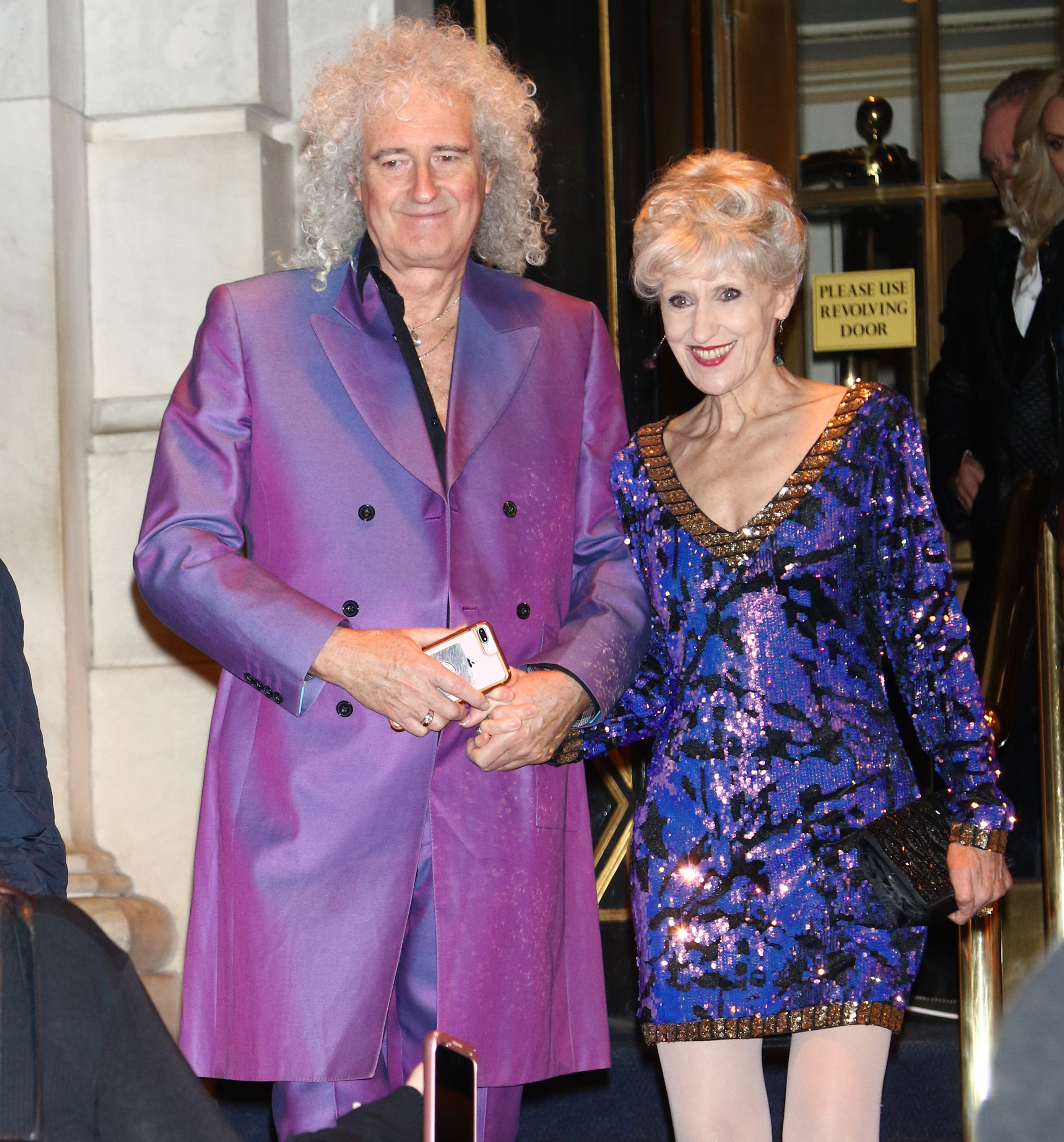Brian May with wife Anita Dobson arriving at the premiere of "Bohemian Rhapsody" on October 30, 2018 | Source: Getty Images