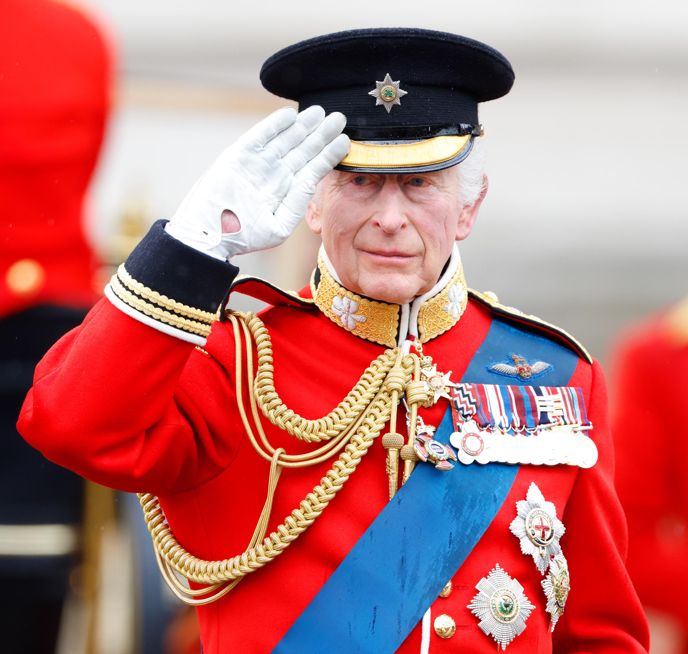 King Charles III salutes outside Buckingham Palace in London after Trooping the Colour on June 15, 2024. | Source: Getty Images