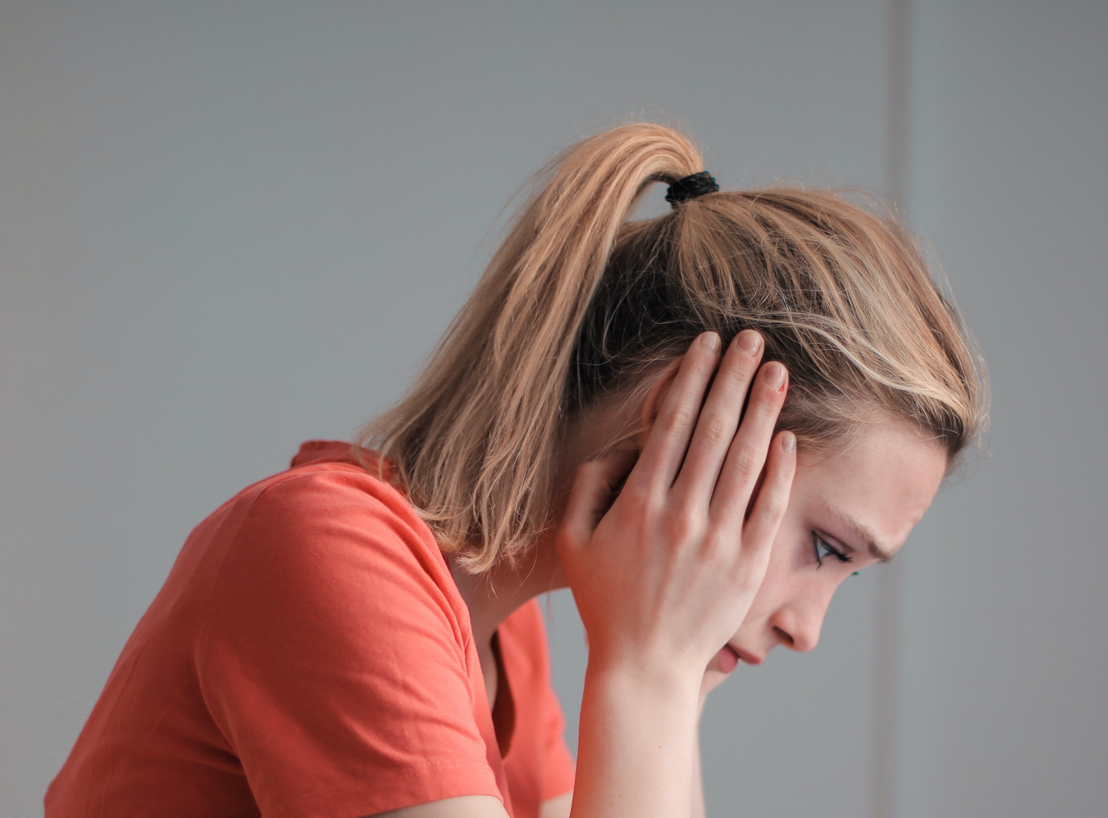 A woman looking worried  | Source: Pexels