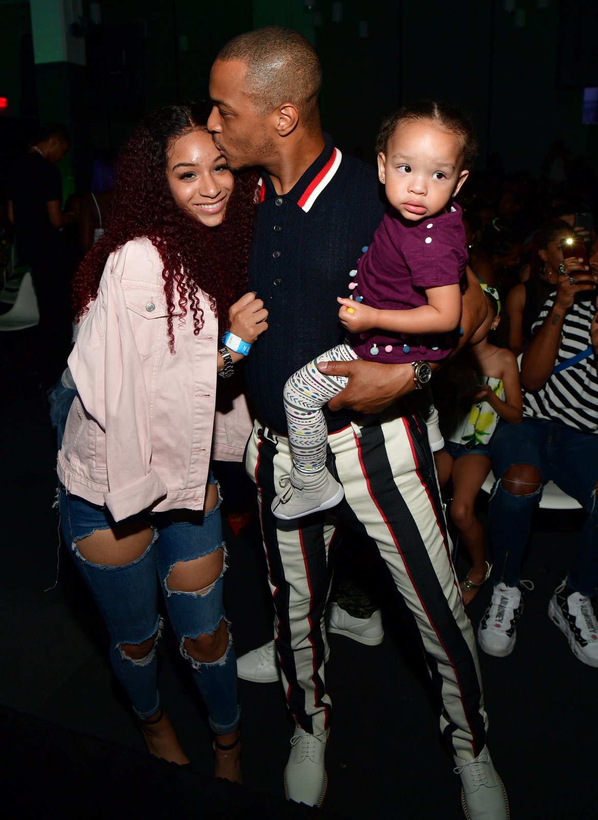 Deyjah Harris with her father T.I and sister at "The Grand Hustle" Viewing Party in Atlanta on July 19, 2018 | Source: Getty Images 