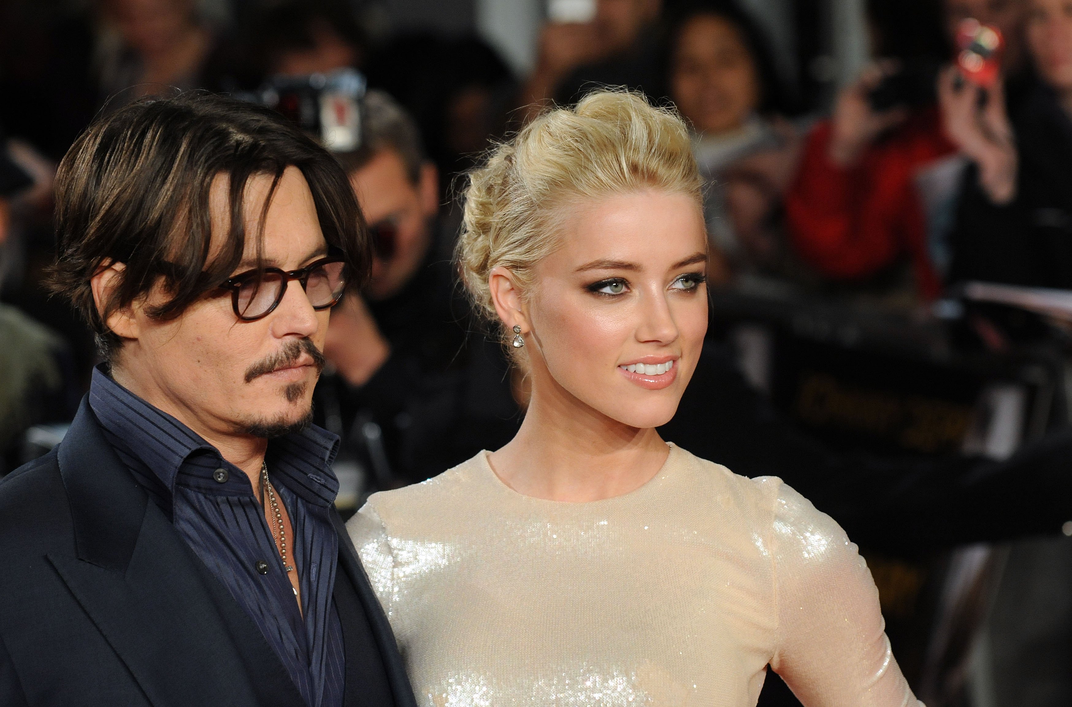 Johnny Depp and Amber Heard at the UK premiere of "The Rum Diary" on November 3, 2011 | Source: Getty Images