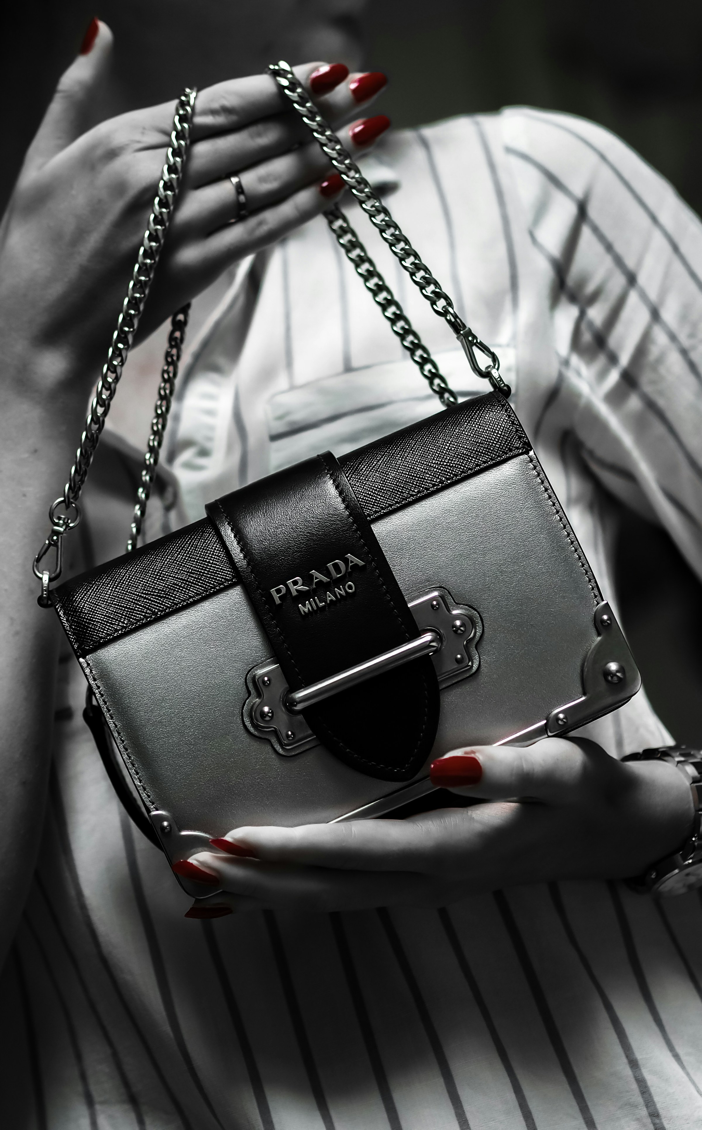 A woman holding a designer bag | Source: Unsplash