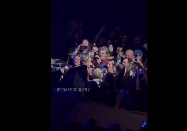 Keith Urban in the crowd with a fan during his recent concert from a post dated October 18, 2025. | Source: TikTok/up2datecountry.live