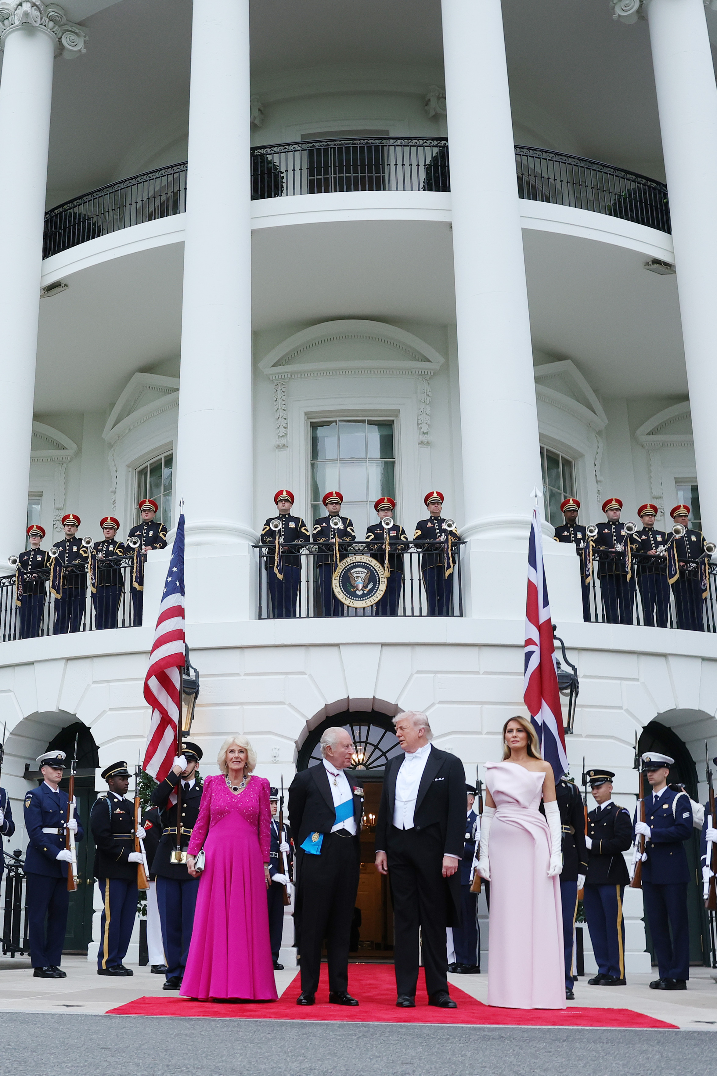 U.S. President Donald Trump and first lady Melania Trump welcome Queen Camilla and King Charles III to the White House for a state dinner on 28 April 2026 in Washington, DC. | Source: Getty Images