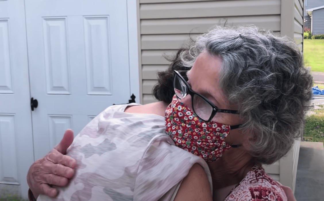 A mother and her daughter embrace for the first time in five decades | Photo: Youtube/PBS Voices