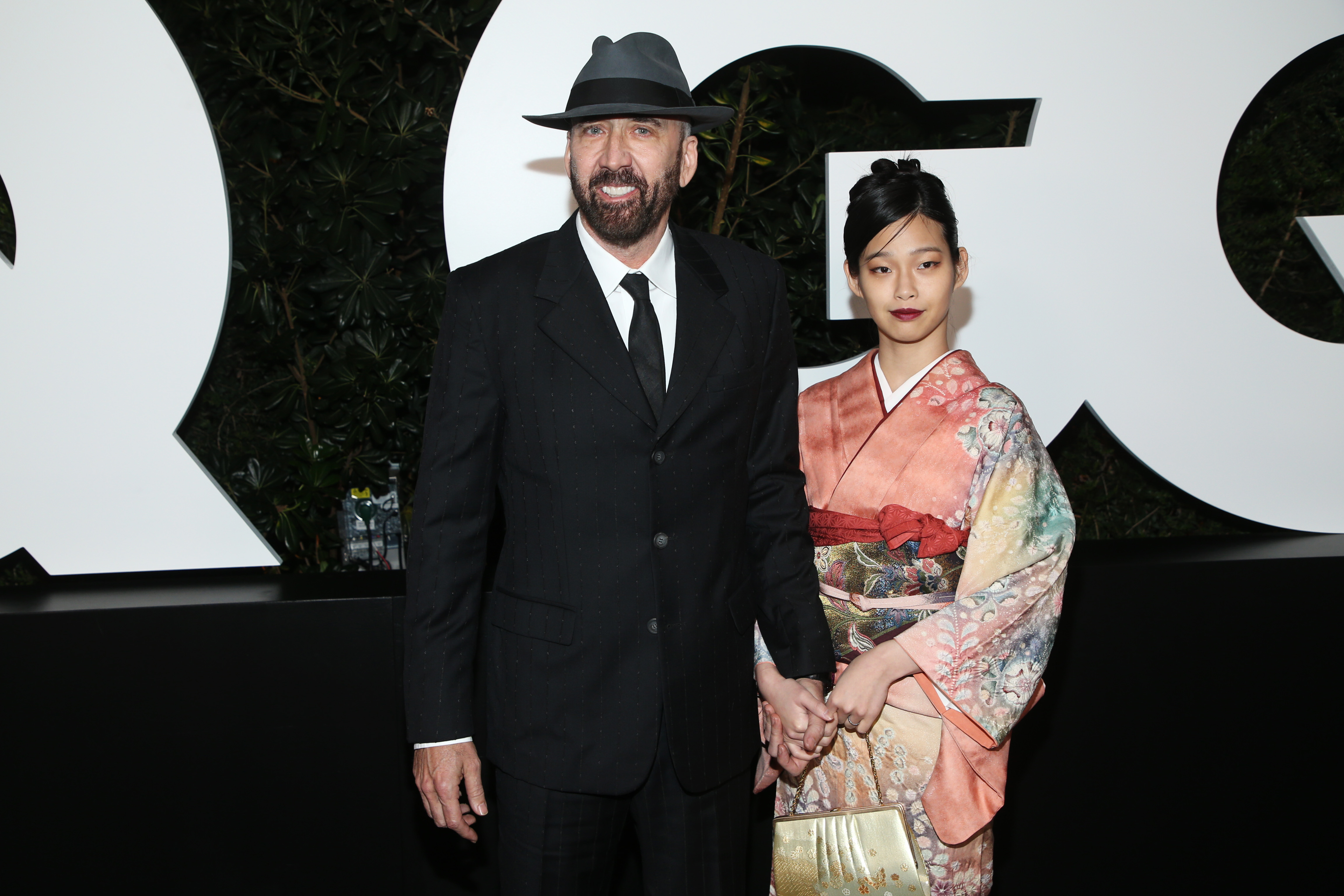 Nicholas Cage and Riko Shibata at the GQ Men of The Year Celebration on November 18, 2021, in West Hollywood, California | Source: Getty Images