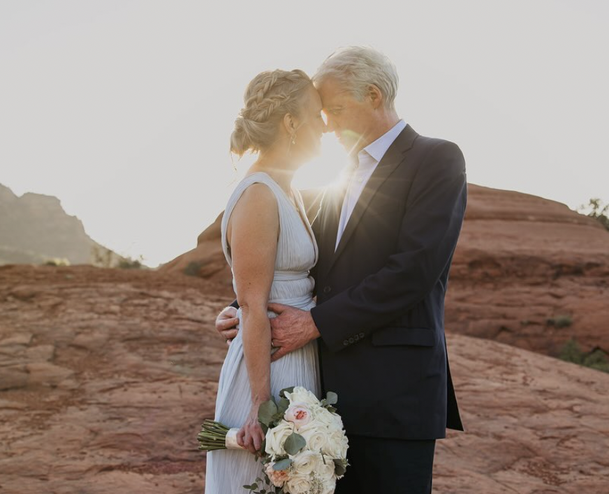The newlyweds sharing a moment | Source: Instagram/catjarman