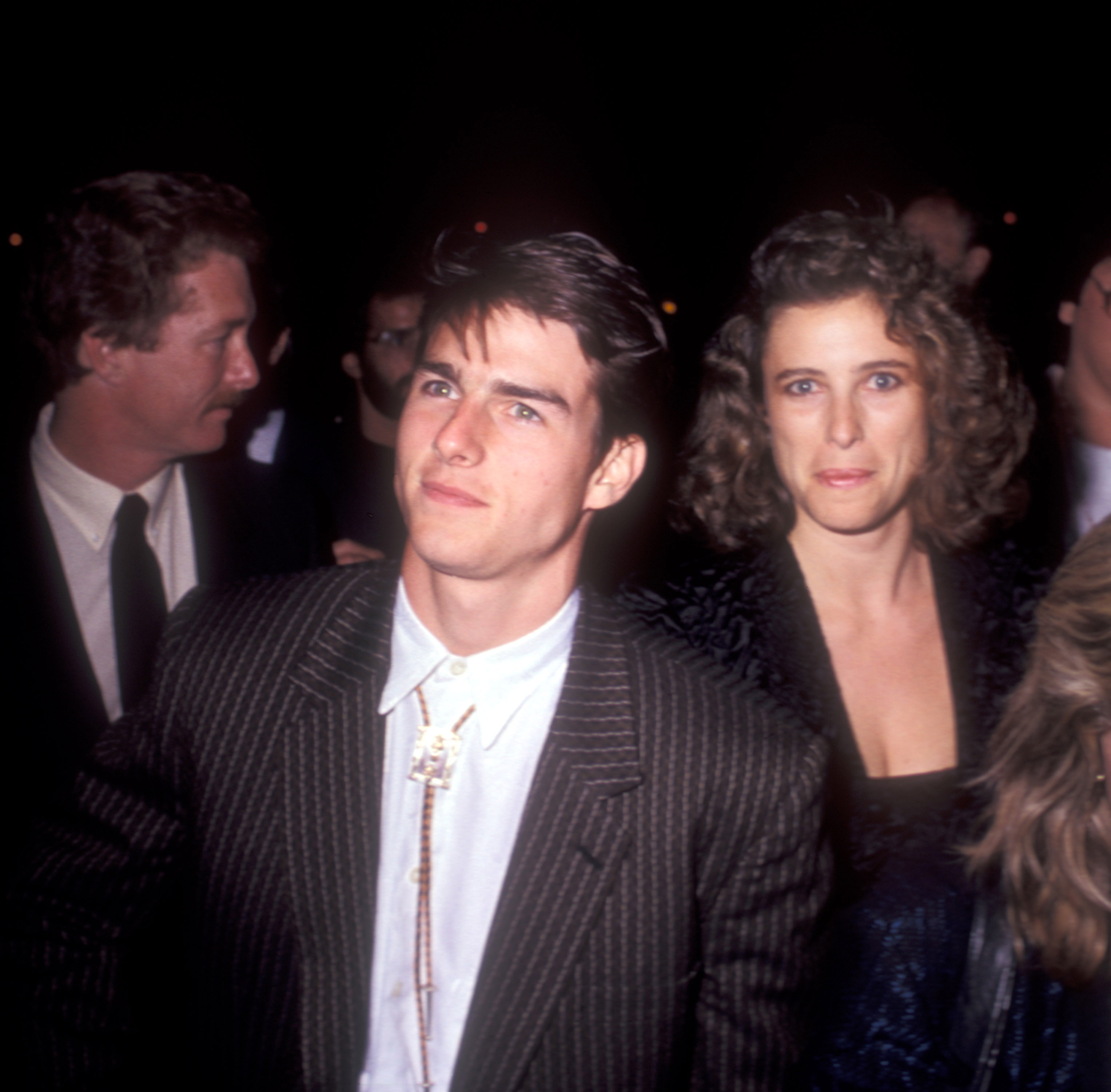 Tom Cruise and Mimi Rogers during "The Color of Money" premiere on October 14, 1986 in Los Angeles, California | Source: Getty Images