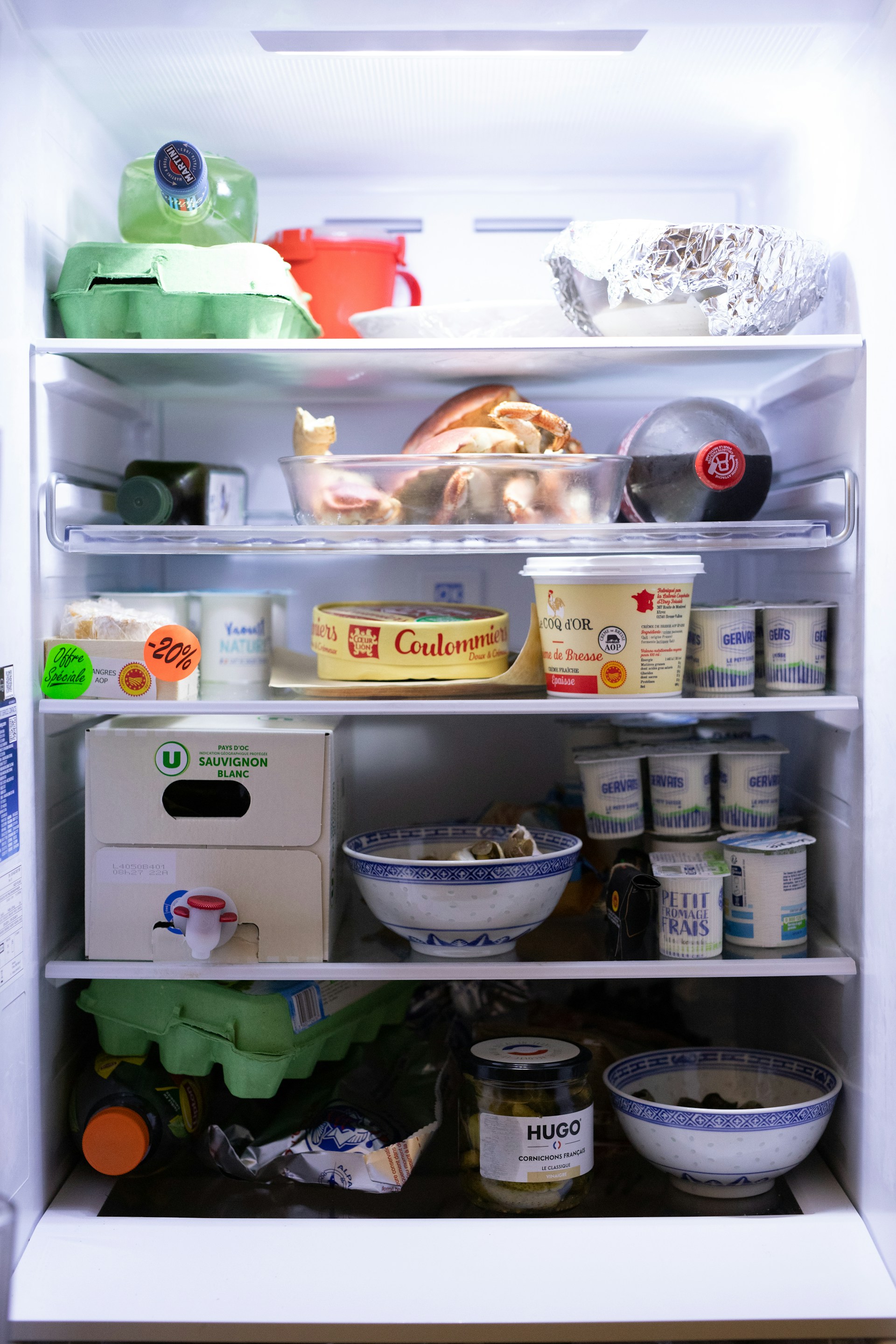 Food items stocked in a fridge | Source: Unsplash