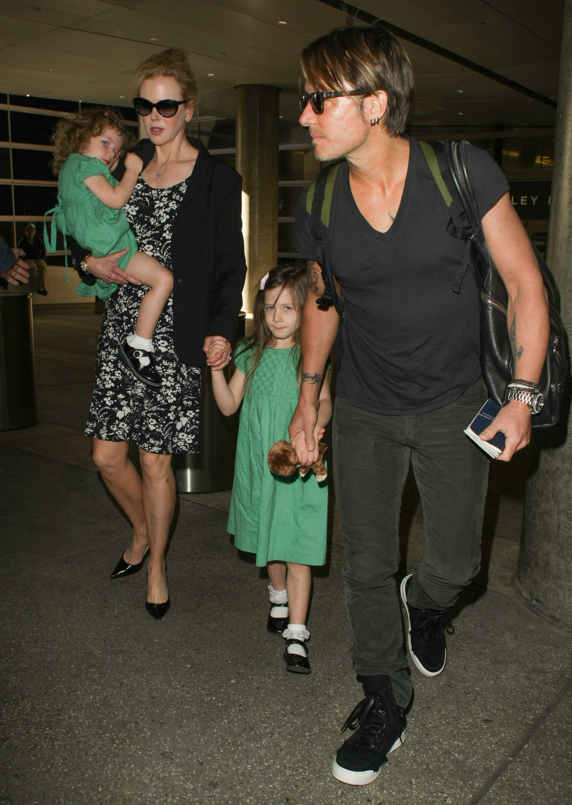 Nicole Kidman and Keith Urban with Sunday Rose and Faith Margaret are seen at LAX airport on January 2, 2014 in Los Angeles, California | Source: Getty Images