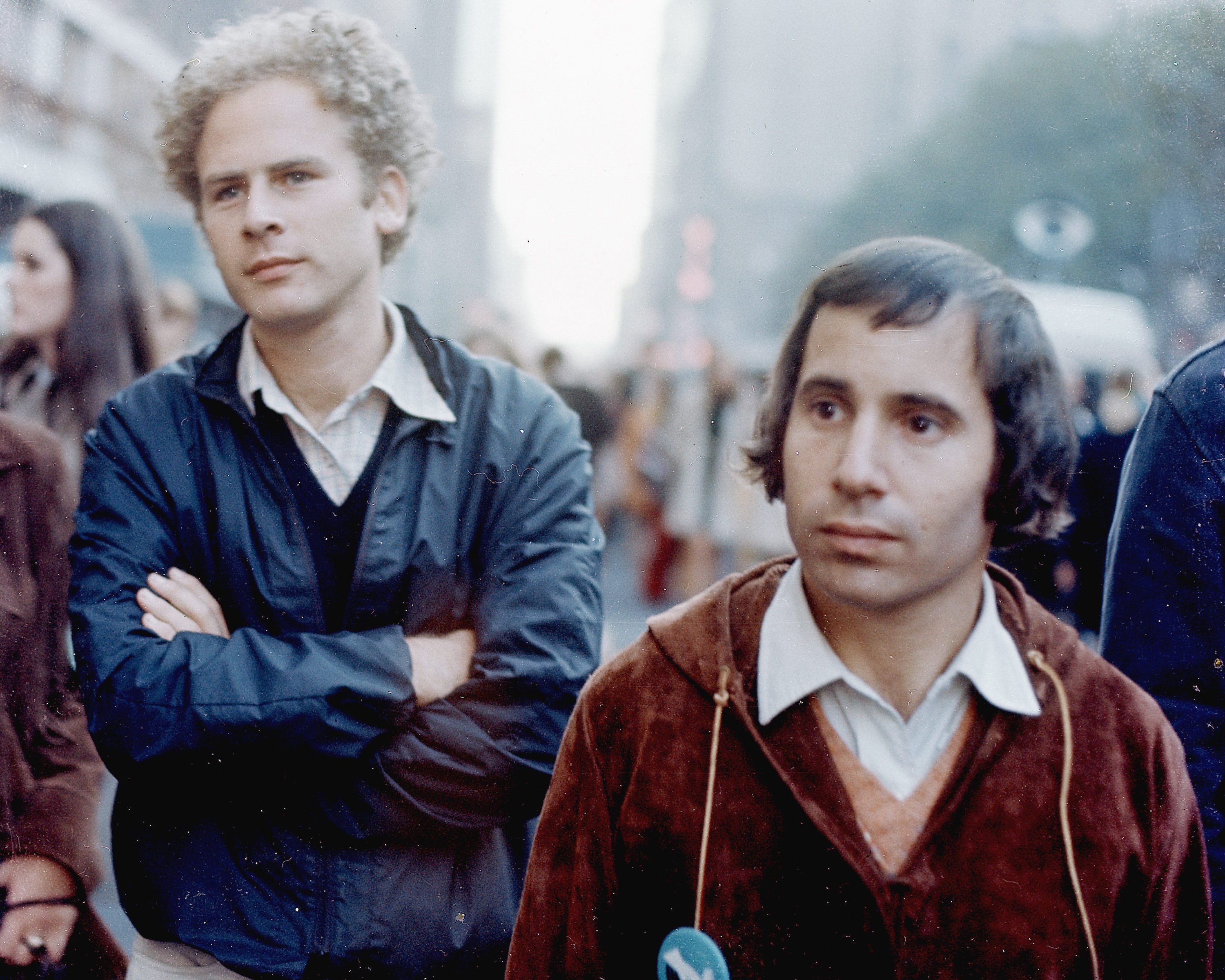 Art Garfunkel and Paul Simon stand during the filming of "Songs of America," which aired on November 30, 1969. | Source: Getty Images