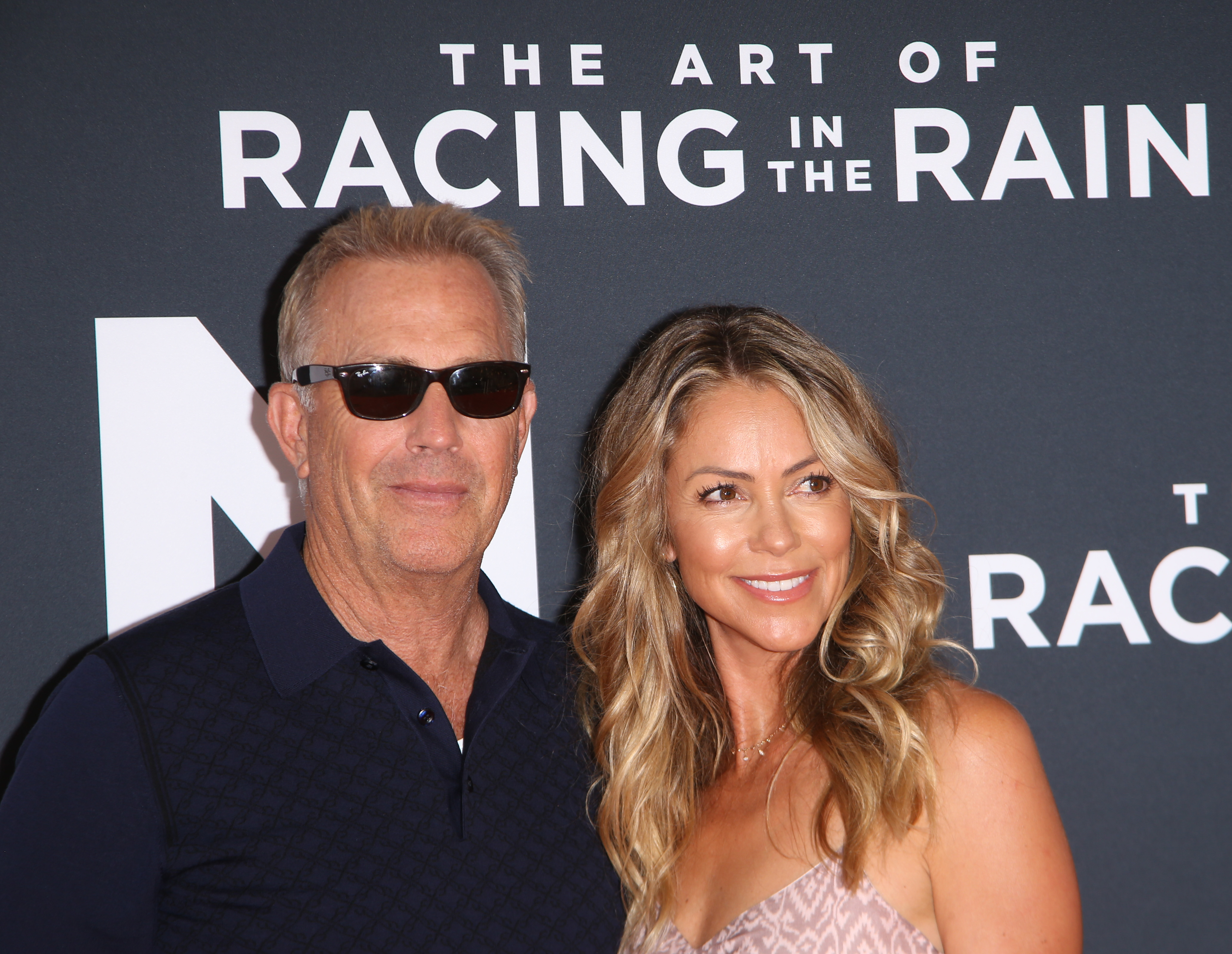 Kevin Costner and Christine Baumgartner at the Los Angeles premiere of "The Art of Racing In The Rain" on August 1, 2019, in Los Angeles, California | Source: Getty Images