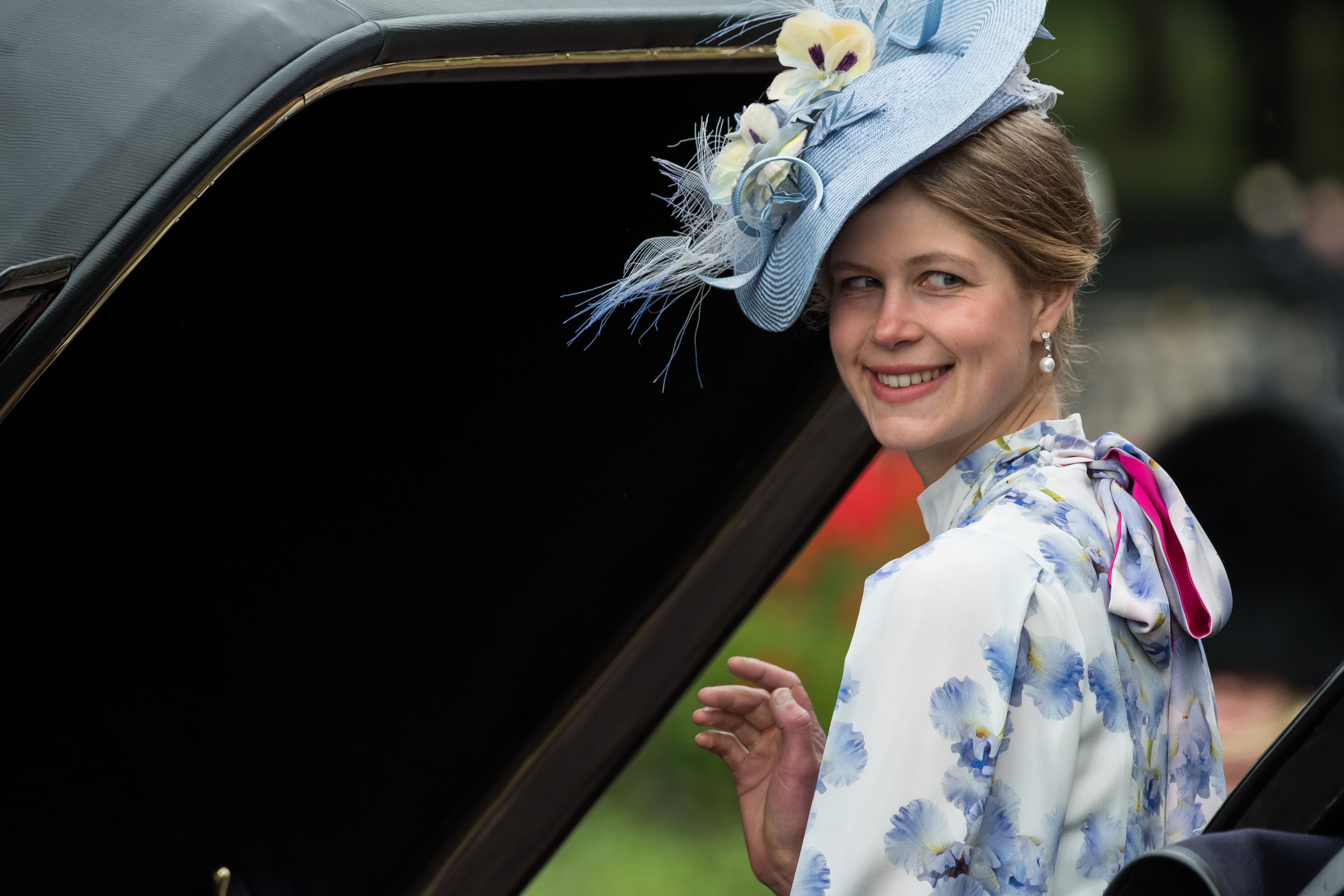Lady Louise Windsor smiles on board a horse-drawn carriage during Trooping the Colour in London, on June 15, 2024. | Source: Getty Images