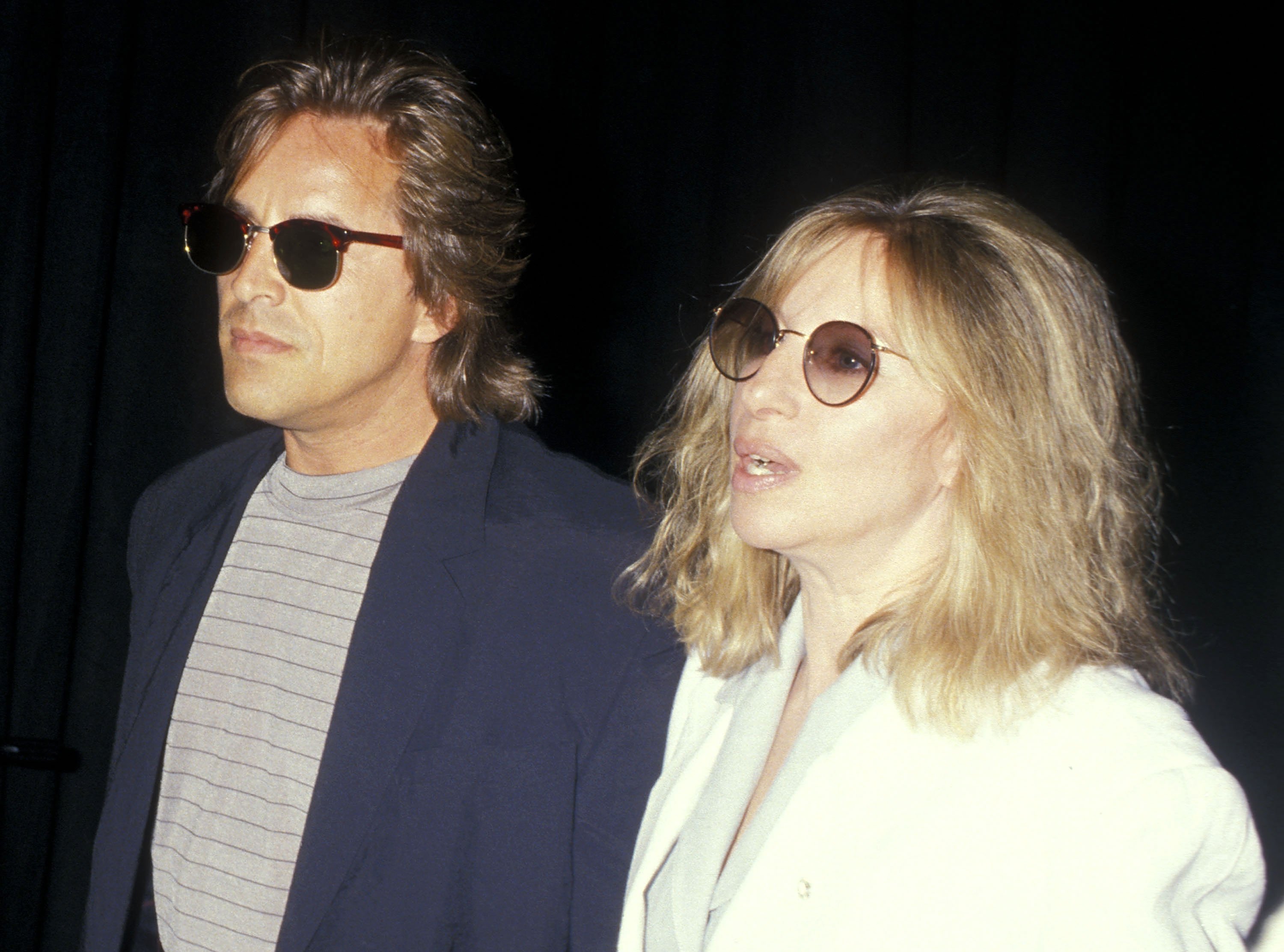 Don Johnson and  Barbra Streisand attend the 14th Annual NATO/ShoWest Convention on February 24, 1988, at Bally's Hotel & Casino in Las Vegas, Nevada. | Source: Getty Images