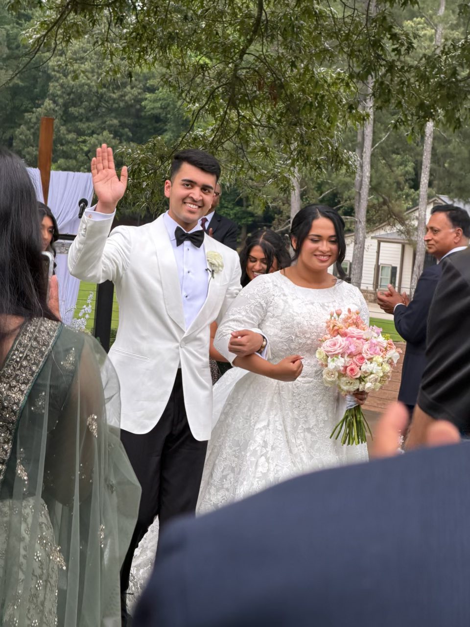 Dave and Jesni Fiji is seen on their wedding day in a post dated May 31, 2026 | Source: Facebook/jaison.mathew57