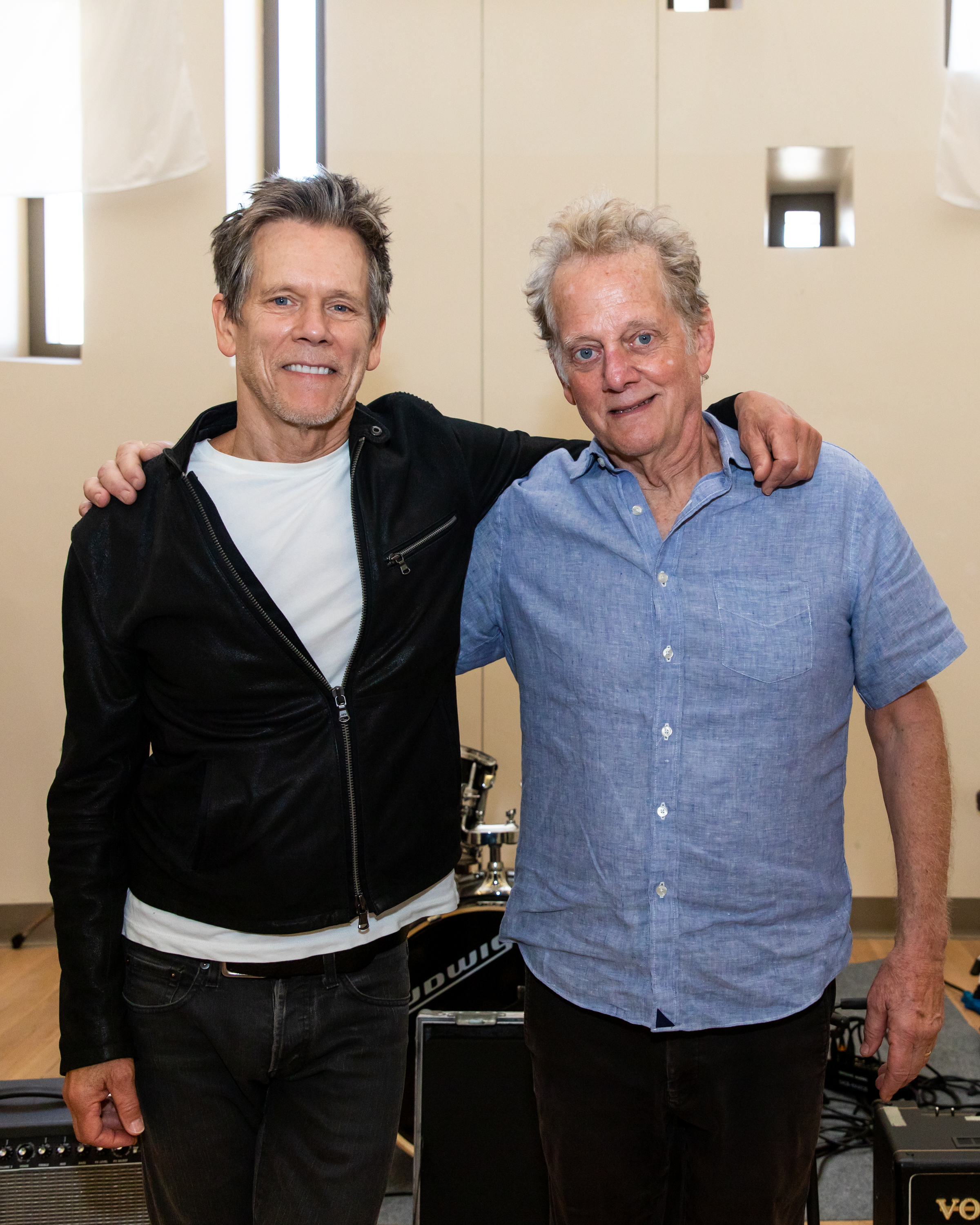 The actor and his brother, Michael Bacon of the Bacon Brothers, pose onstage at Cook County Jail on September 21, 2024, in Chicago, Illinois. | Source: Getty Images