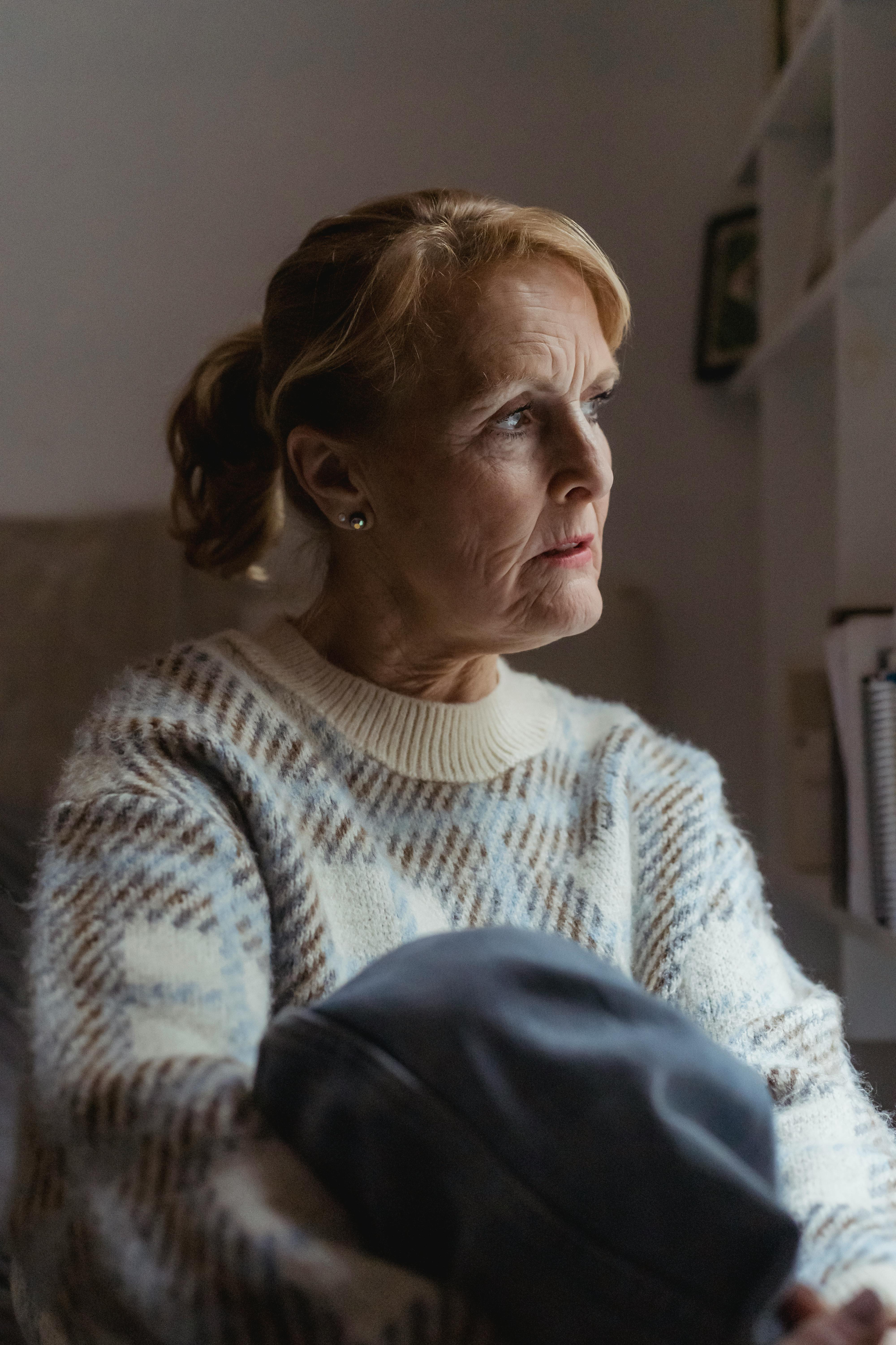 A thoughtful middle-aged woman | Source: Pexels