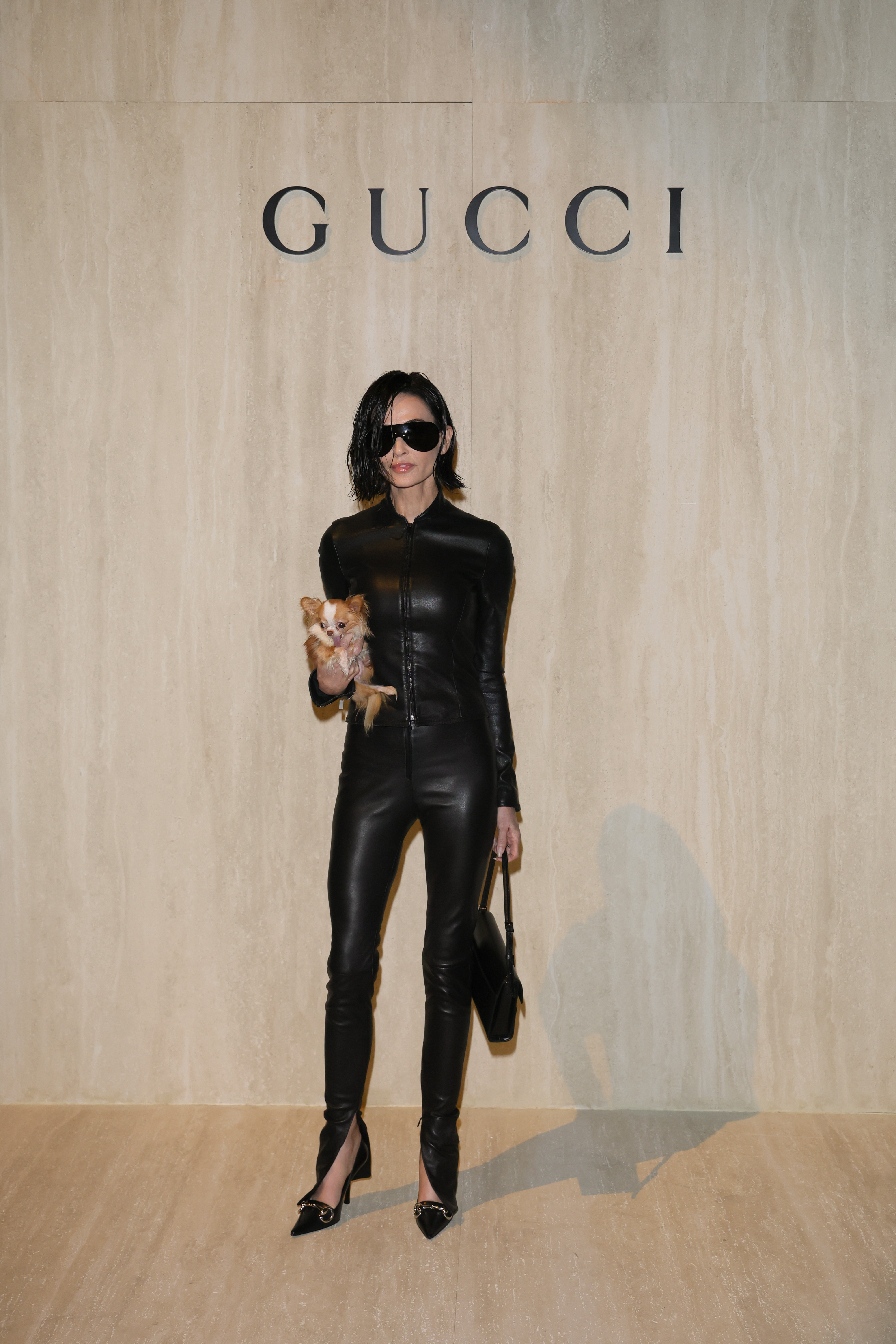 Demi Moore attends the Gucci FW26 Fashion Show at Palazzo Delle Scintille on February 27, 2026, in Milan, Italy.